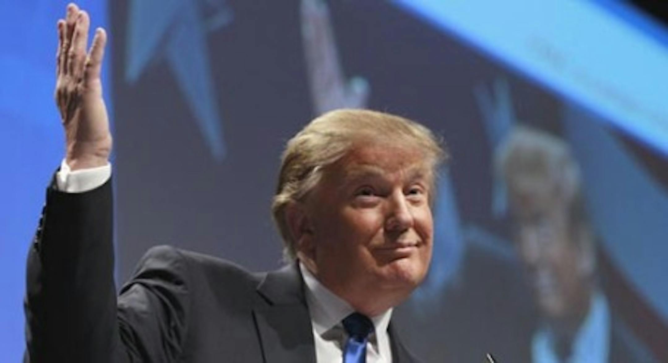 Donald Trump  gestures while addressing the Conservative Political Action Conference (CPAC) in Washington, Thursday, Feb. 10, 2011. (AP Photo/Alex Brandon)