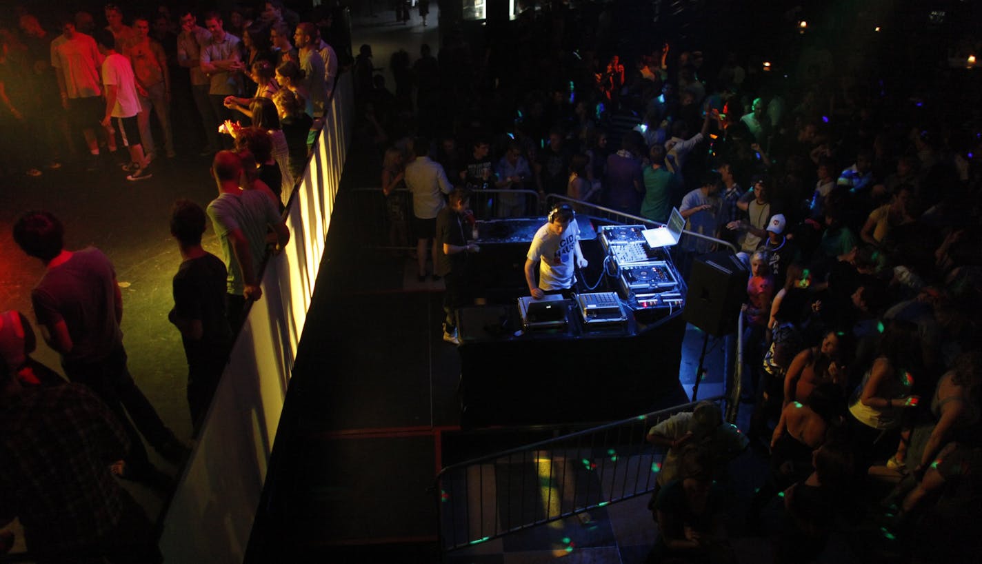 Anthony Souffle ¥ anthony.souffle@startribune.com Minneapolis, Minn - July 11, 2009 - ] DJ Soviet Panda works the sound equipment during the Too Much Love dance party Saturday evening at the night club 1st Ave. in downtown Minneapolis.