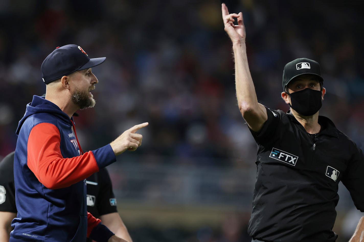 Twins manager Rocco Baldelli is ejected by third base umpire John Tumpane during the 10th inning of the team's game against the Cleveland Guardians on Saturday