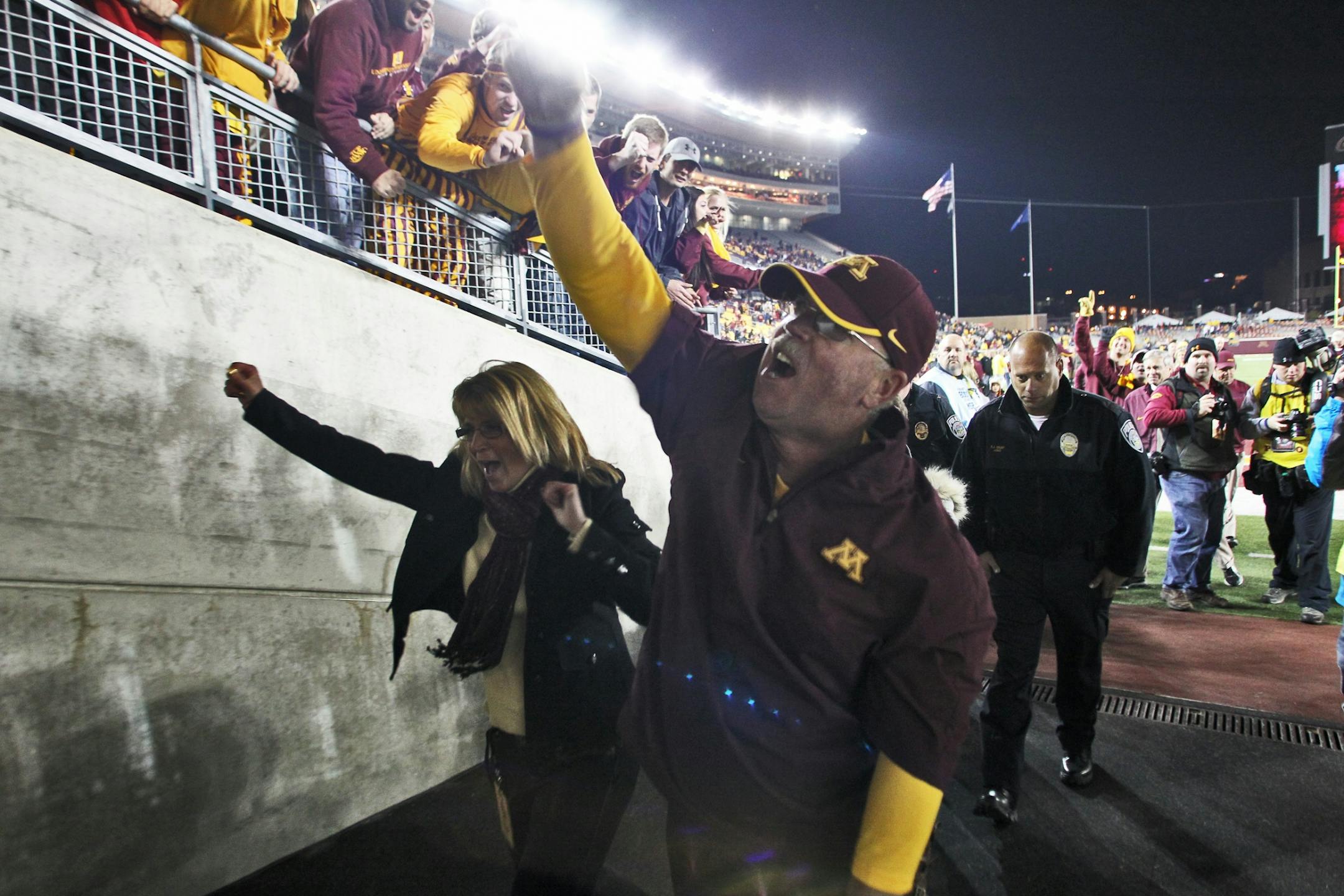 Coach Jerry Kill and his wife, Rebecca, walked jubilantly past the student section at TCF Bank Stadium after the Gophers' victory.