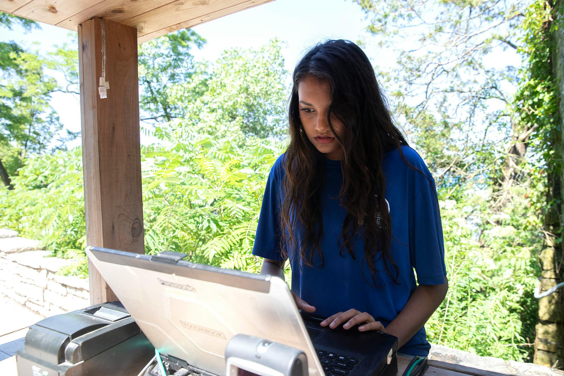 Elayna Whiteman, 15, works as an attendant at Glencoe Beach on July 18, 2019, in Glencoe, Ill. Whiteman, a sophomore at New Trier High School, says having a job during the school year is "impossible," given academic demands.