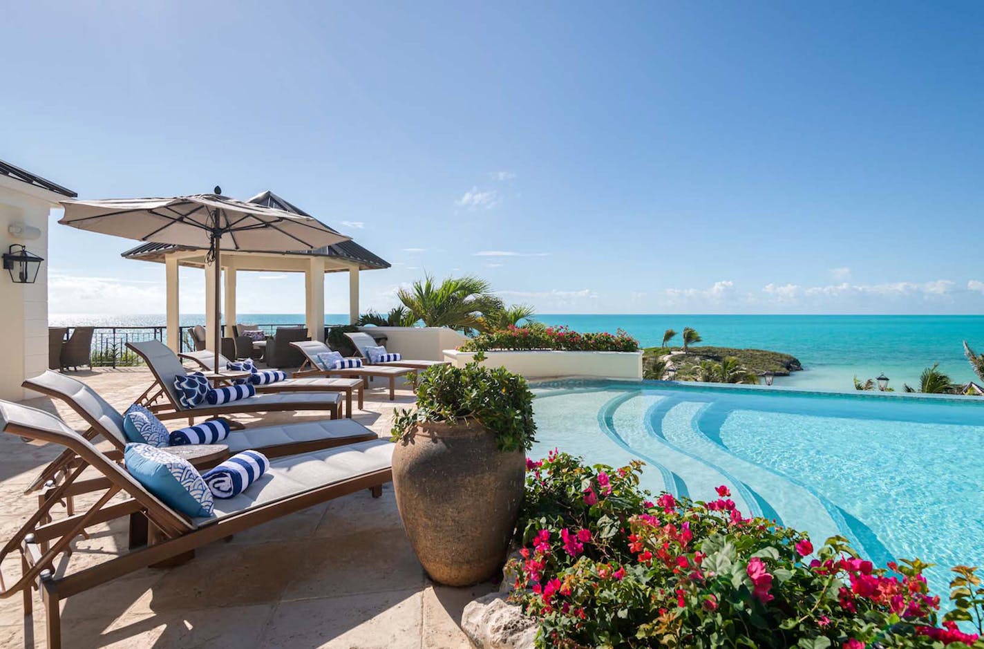 Tom Barnes, the 54-year-old owner of a Charlotte-based private equity firm, has begun leasing stays at a two-mansion property he owns in Turks &amp; Caicos, the group of tropical islands about 575 miles southeast of Miami. The late rock and roll Hall of Famer Prince once owned one of the mansions, which Barnes bought in 2019. Brarnes also bought the mansion next door to the former Prince mansion in 2021 and began leasing both in January 2022, after he and his wife, Sharon, served as general contractors on millions of dollars in renovations to the mansions. A night's stay ranges from $12,000 to $36,000, depending on the season and whether both mansions are leased or just one. (Sean Brady/Emara Properties/TNS) ORG XMIT: 40751930W