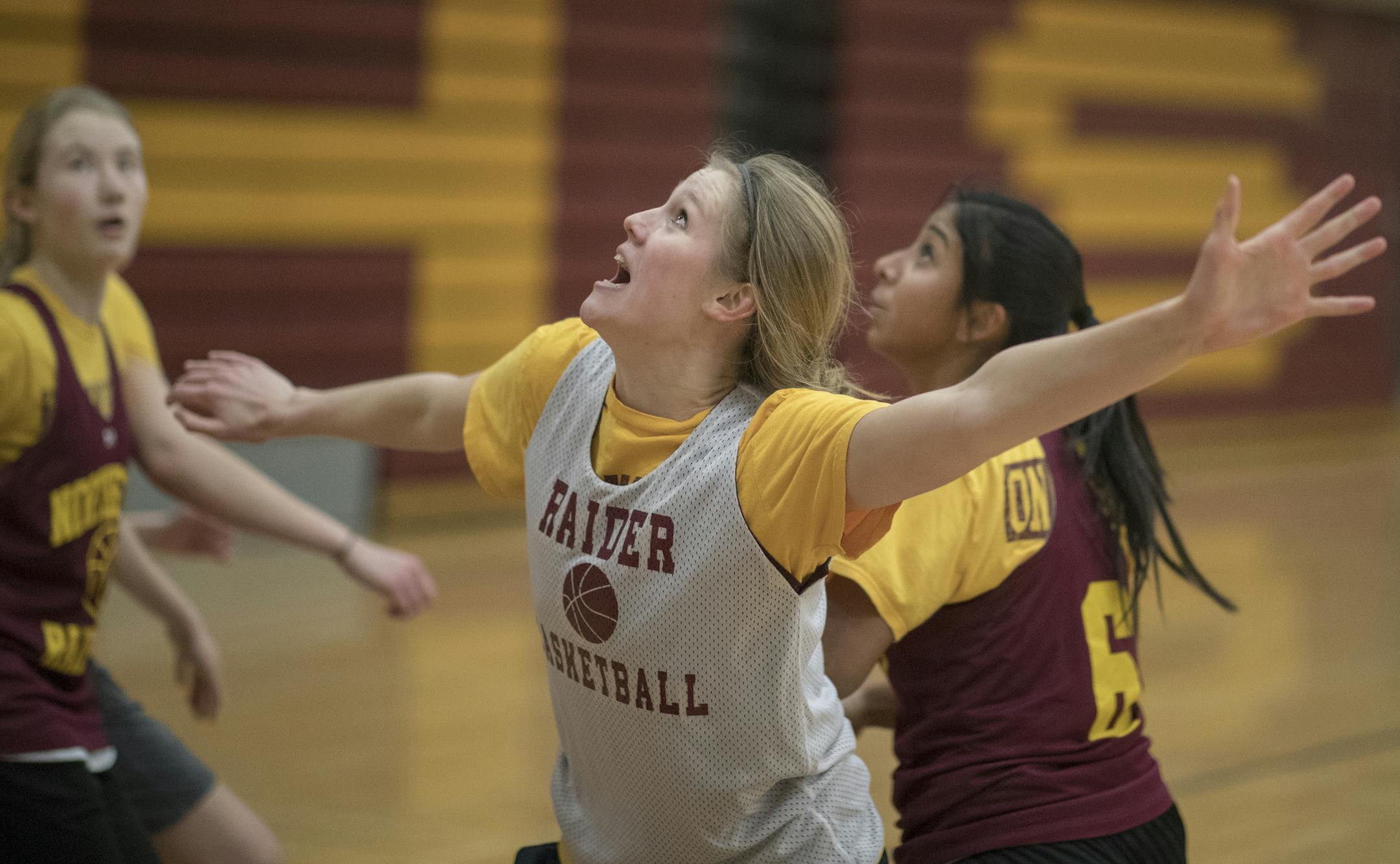 Senior center Annika Hoff, in middle above, has played more than 100 games for Northfield.
