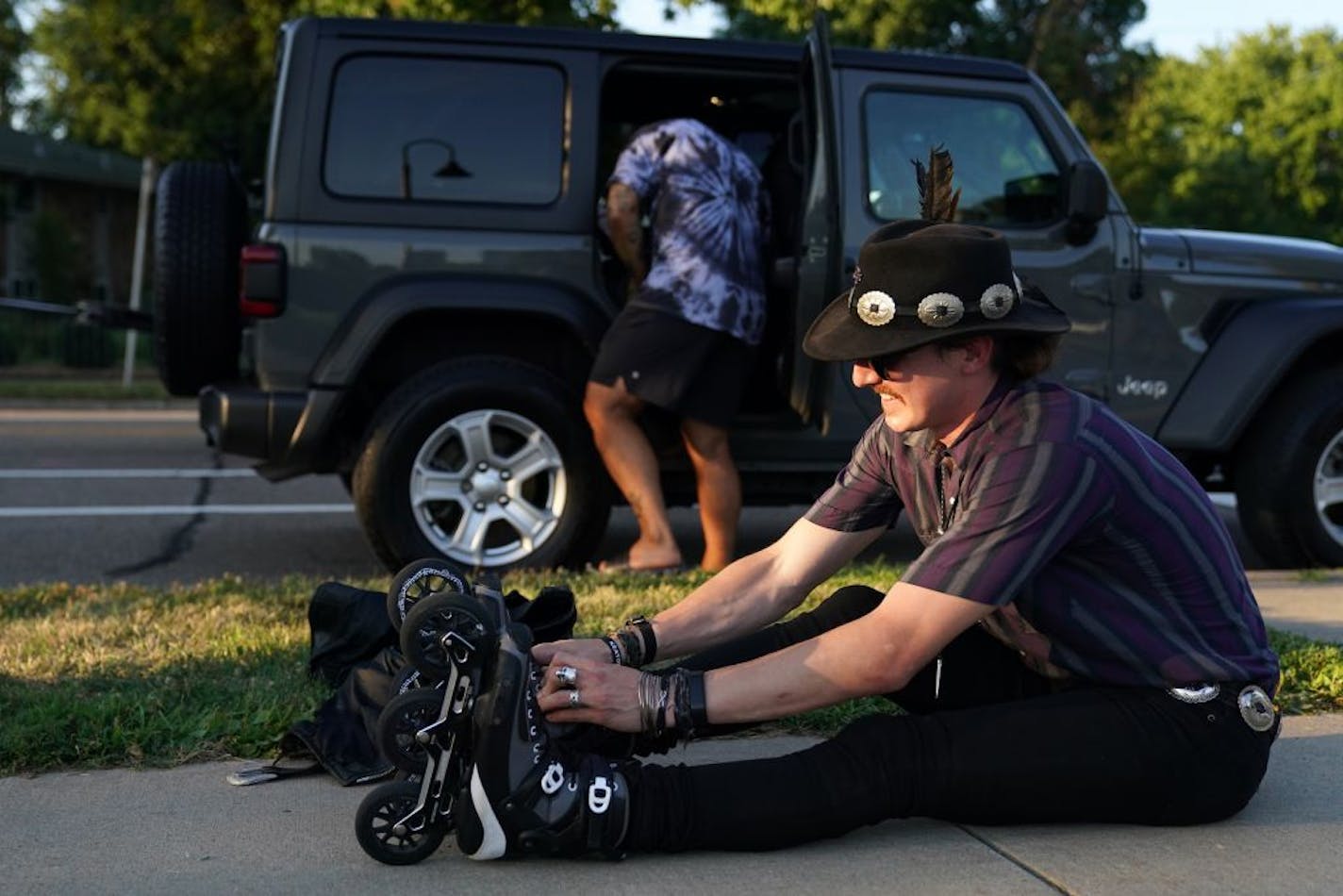 Chris Farmer, a professional rollerblader, laced up his skates before a friendly outing from the Northeast to Loring Park.