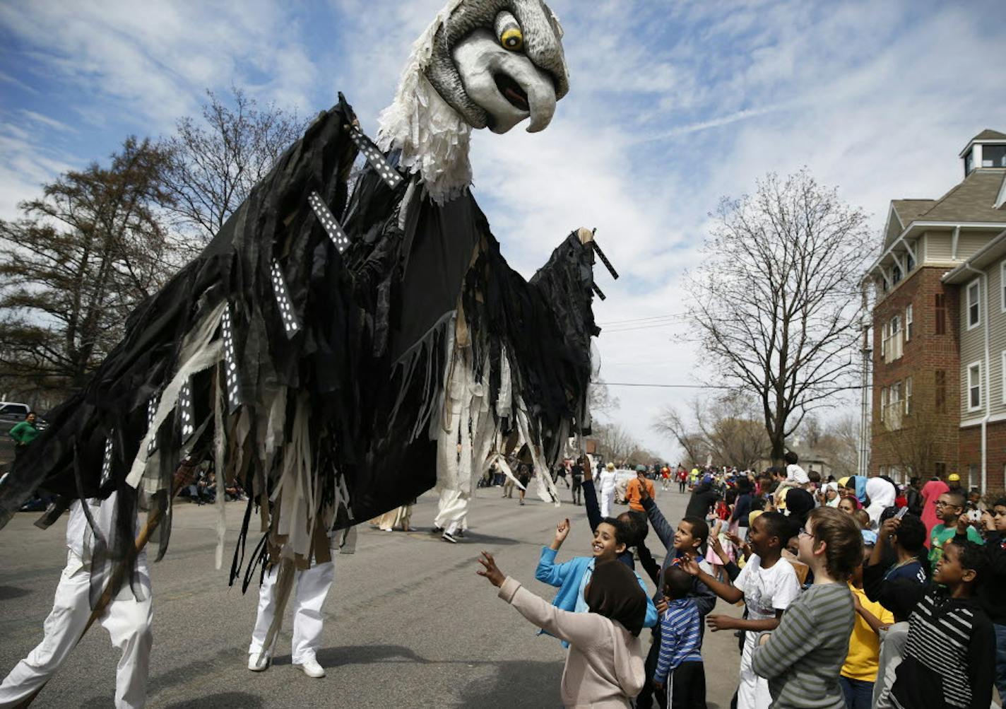 A giant bird puppet at the 2013 May Day Parade in Minneapolis, The annual event is sponsored by Heart of the Beast Puppet and Mask Theatre, which faces a financial shortfall as its fiscal year ends.