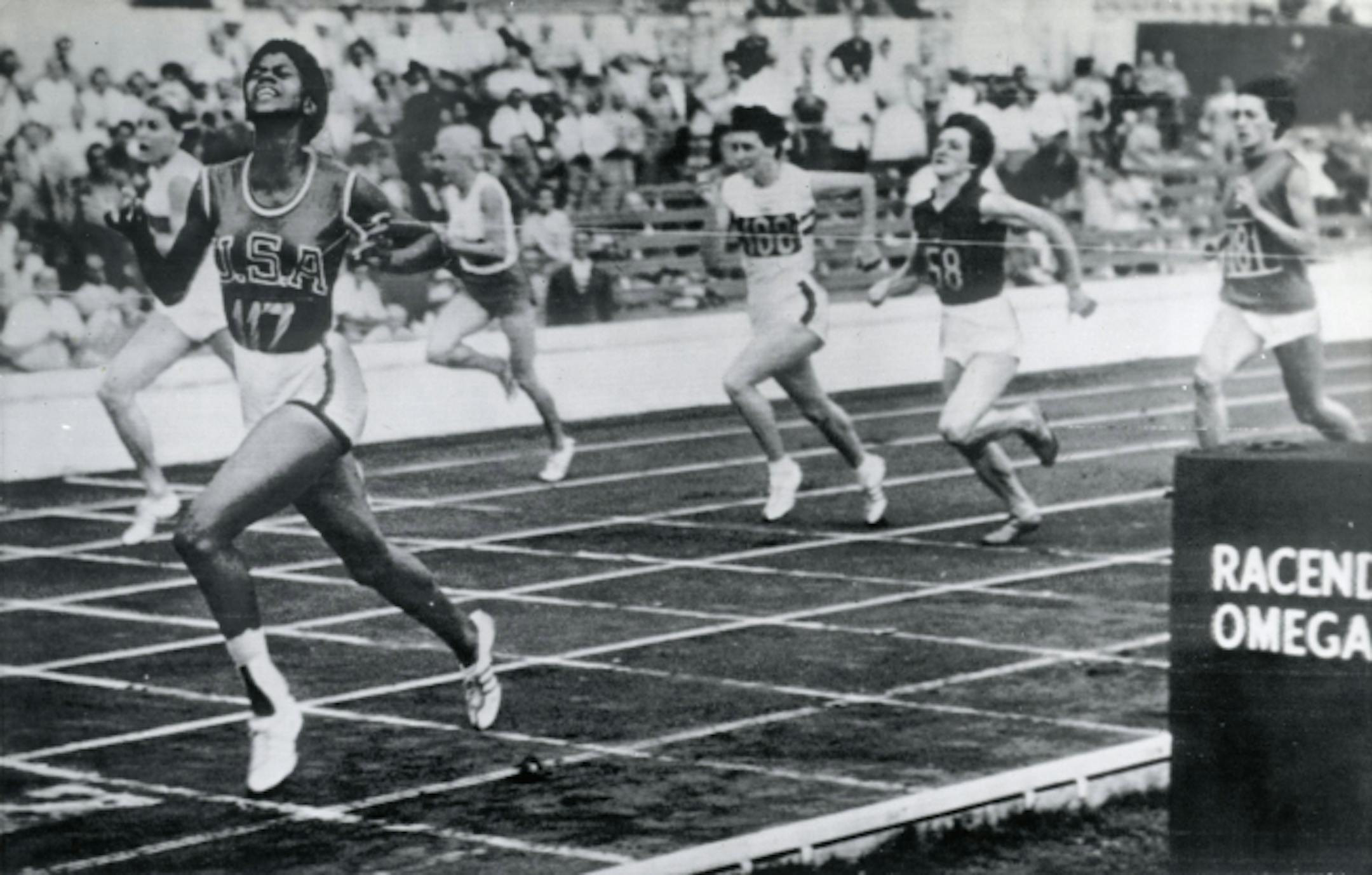 Wilma Rudolph wins the 200 meters at the 1960 Rome Olympics.