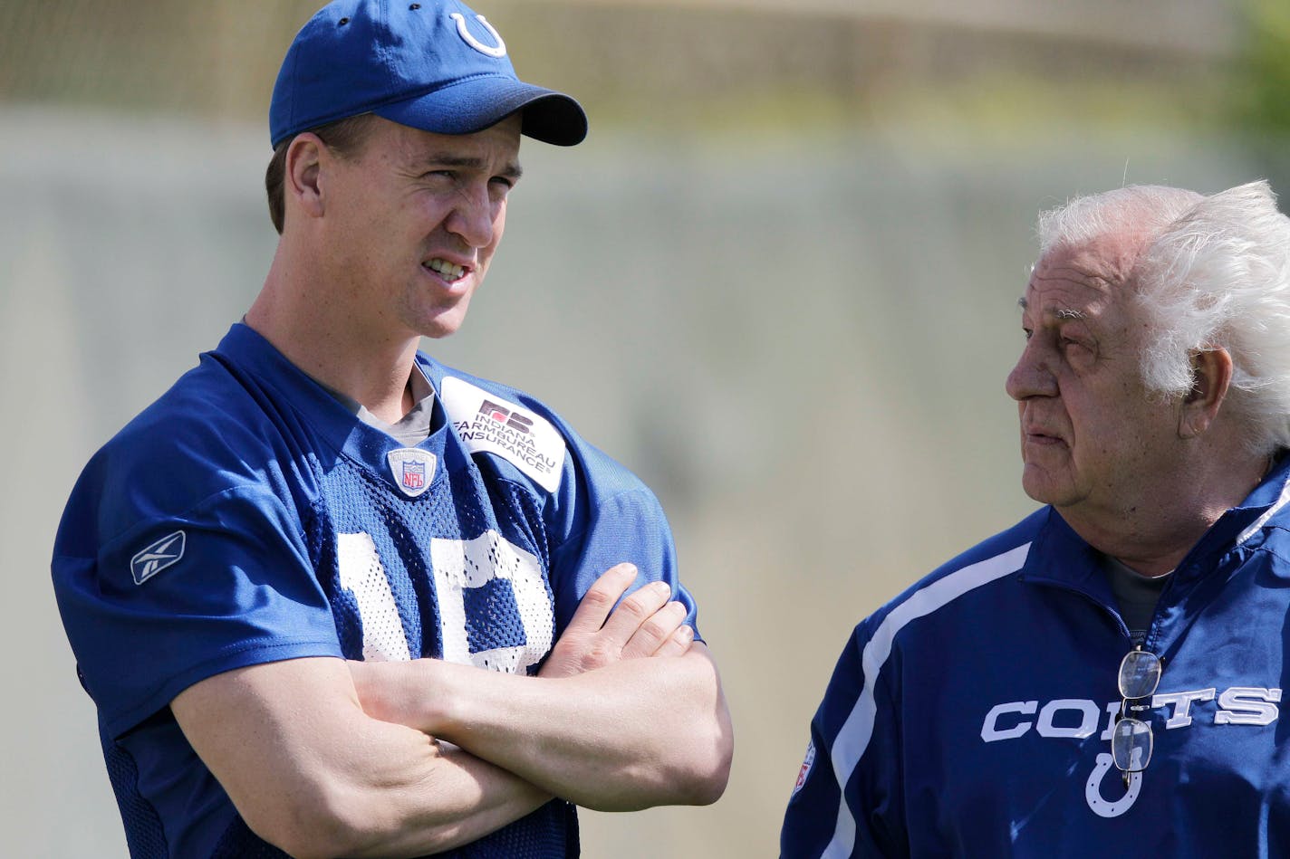 Indianapolis Colts quarterback Peyton Manning, left, talks with offensive coordinator Tom Moore during, right, during football practice, Saturday, Feb. 6, 2010 in Davie, Fla. The Colts face the New Orleans Saints in the NFL football Super Bowl XLIV on Sunday in Miami.(AP Photo/Eric Gay)