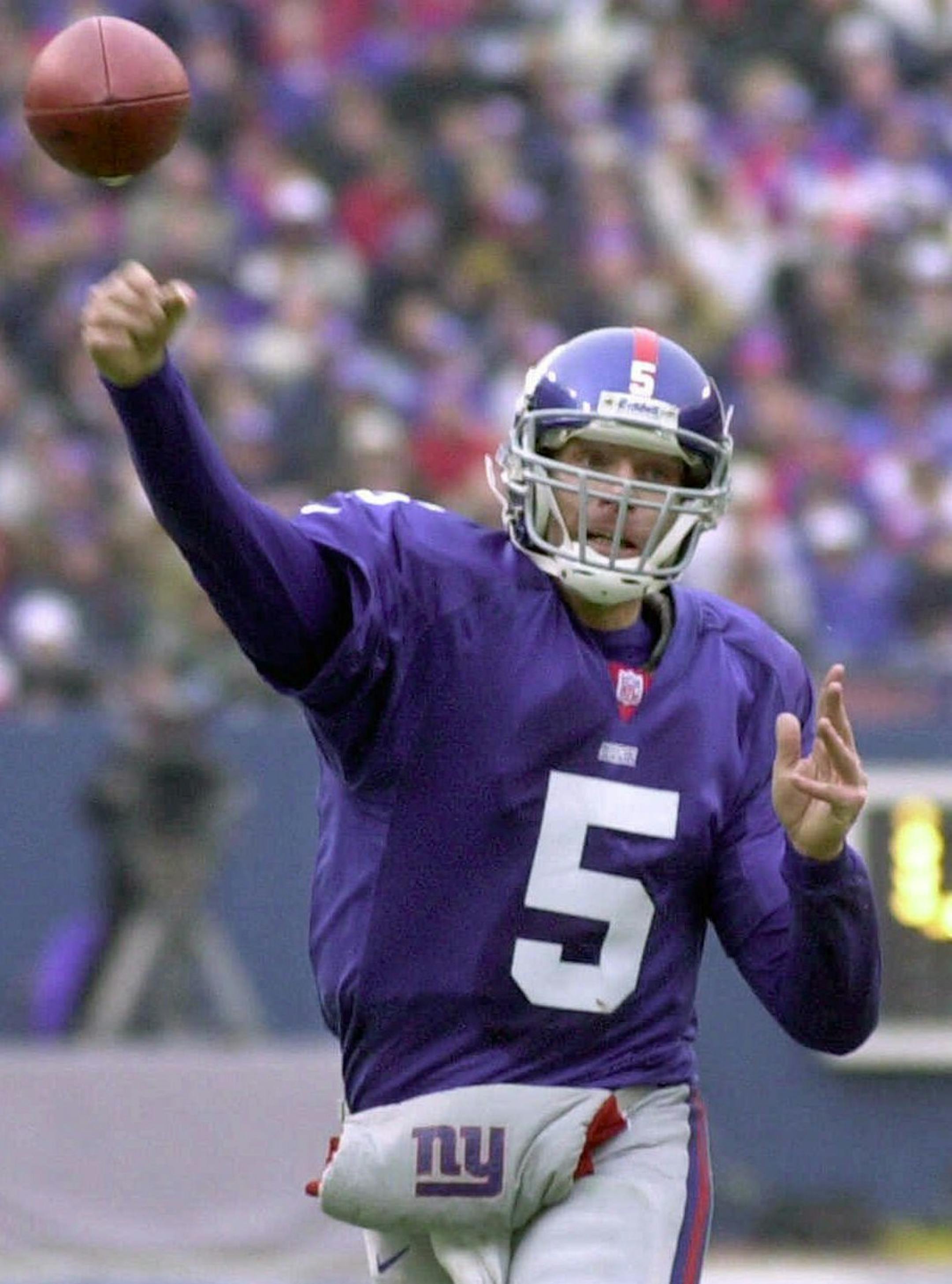 New York Giants quarterback Kerry Collins passes during the second quarter of the NFC championship against the Minnesota Vikings Sunday, Jan. 14, 2001, in East Rutherford, N.J. The Giants meet the Baltimore Ravens in Super Bowl XXXV Sunday Jan. 28, 2001 in Tampa, Fla. (AP Photo/Elise Amendola)