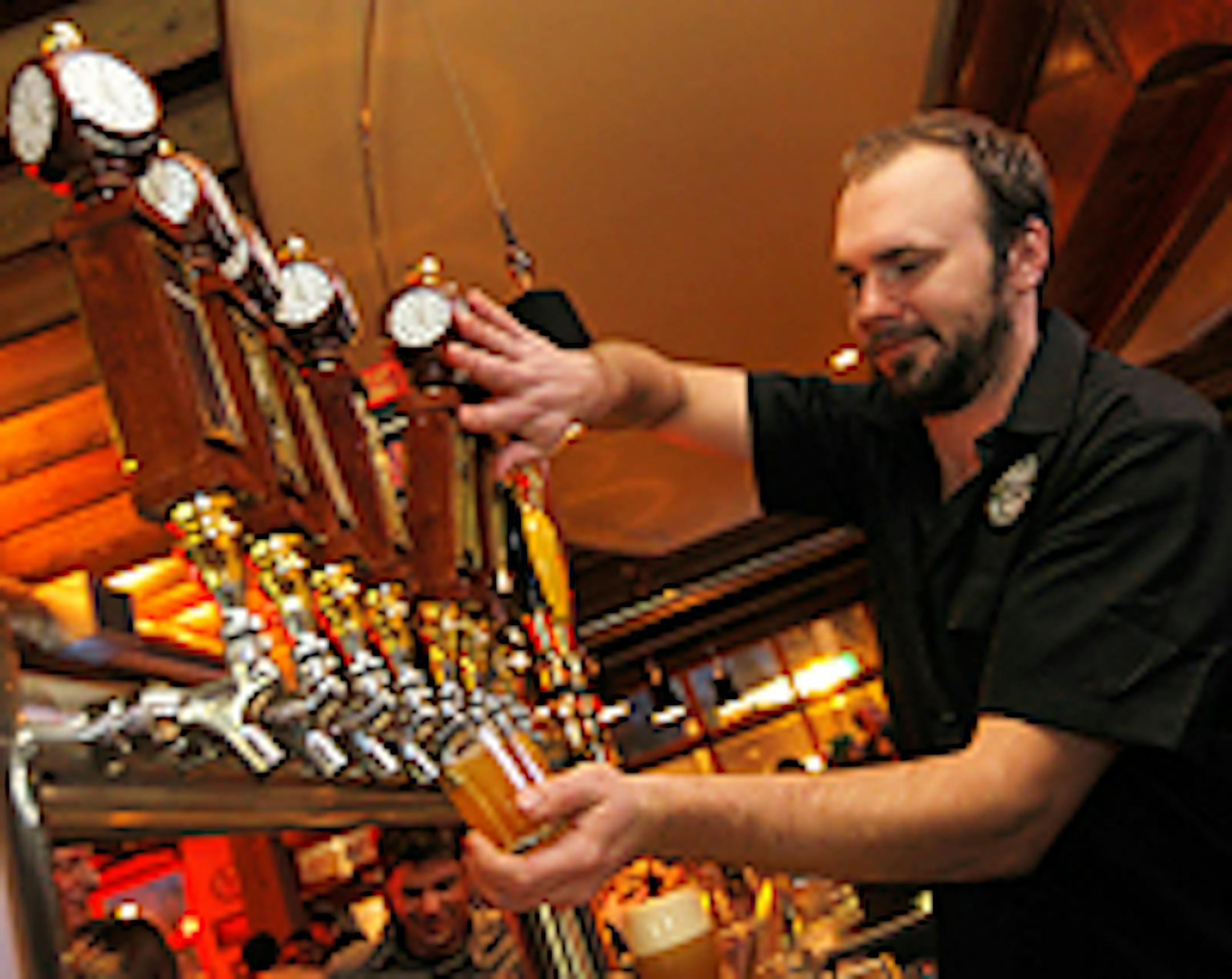 "Bearded bartender" Rolf Bruhn manned the taps on a busy Friday night at the Town Hall Tap