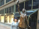 photo of Julie Marie Wade with Mary Tyler Moore statue