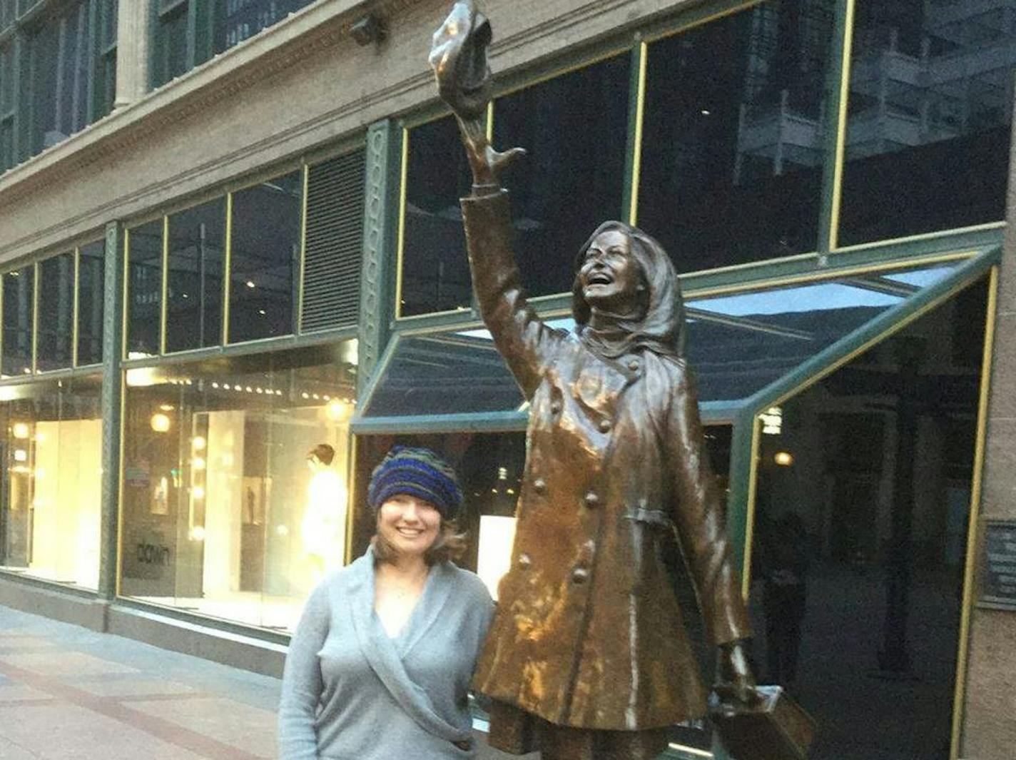 photo of Julie Marie Wade with Mary Tyler Moore statue