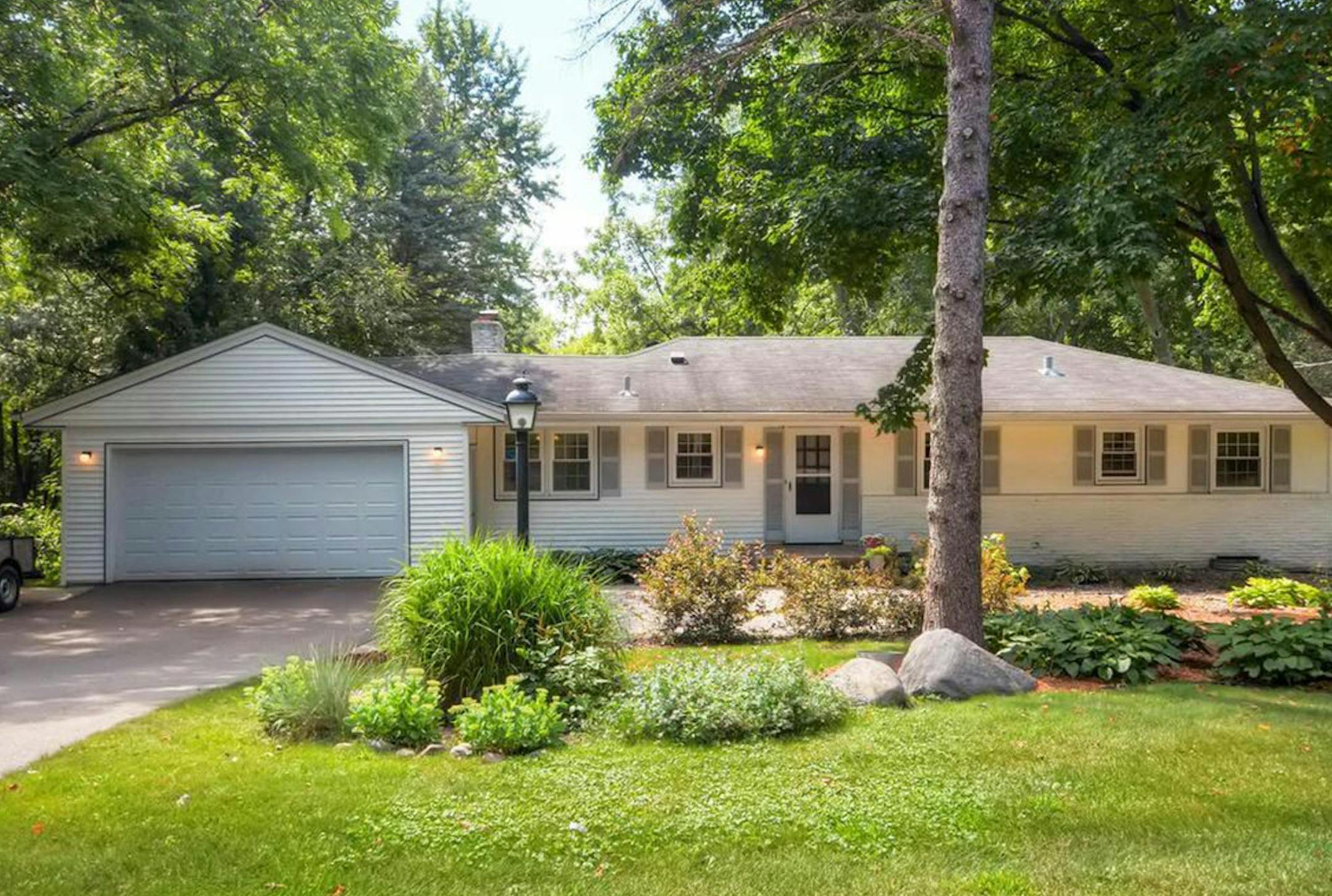 Shorewood
Built in 1960, this four-bedroom, three-bath house has 2,387 finished square feet and features three bedrooms on one level, two fireplaces, hardwood floors, formal dining room, updated kitchen cabinets, countertops and appliances, three-season porch, finished walkout basement and patio. Dale Hildestad, Edina Realty, 952-945-3124.