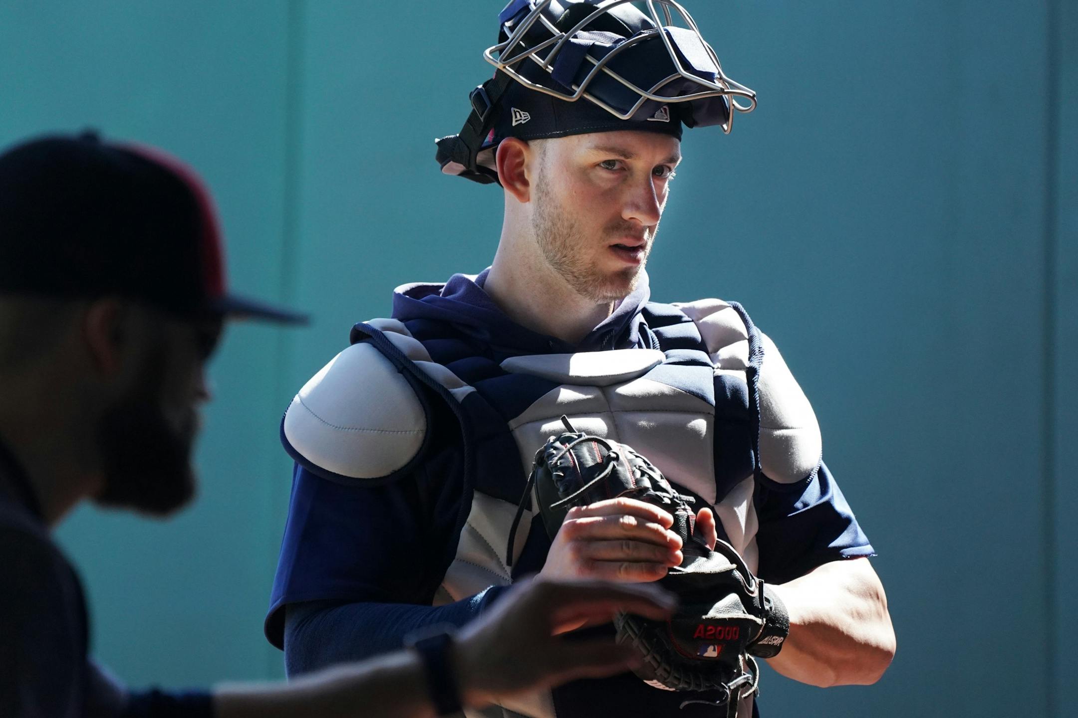 Twins catcher Mitch Garver (18) waited for his turn with the pitching machines in the bullpen Thursday morning.