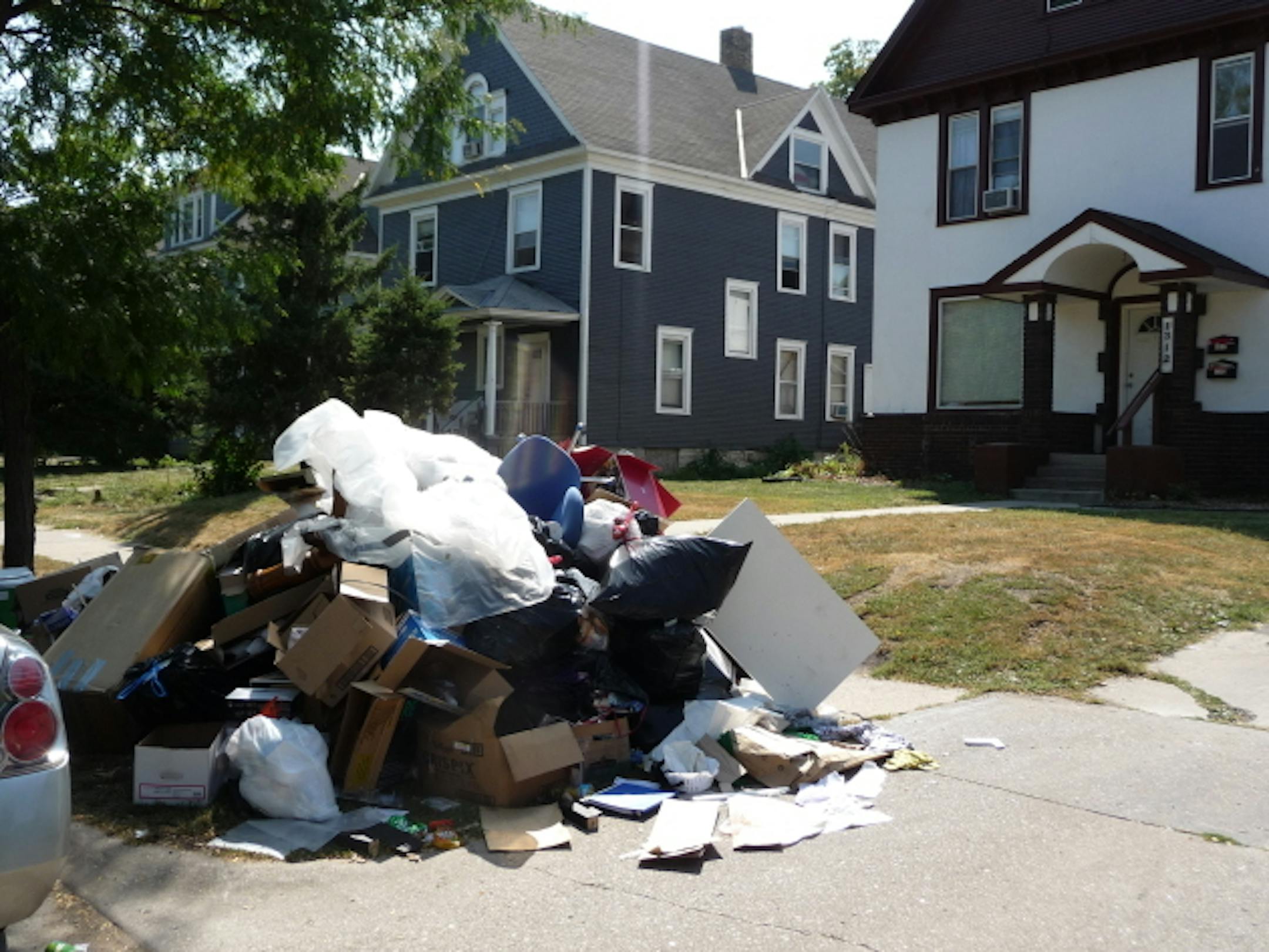 Trash piles in Dinkytown.