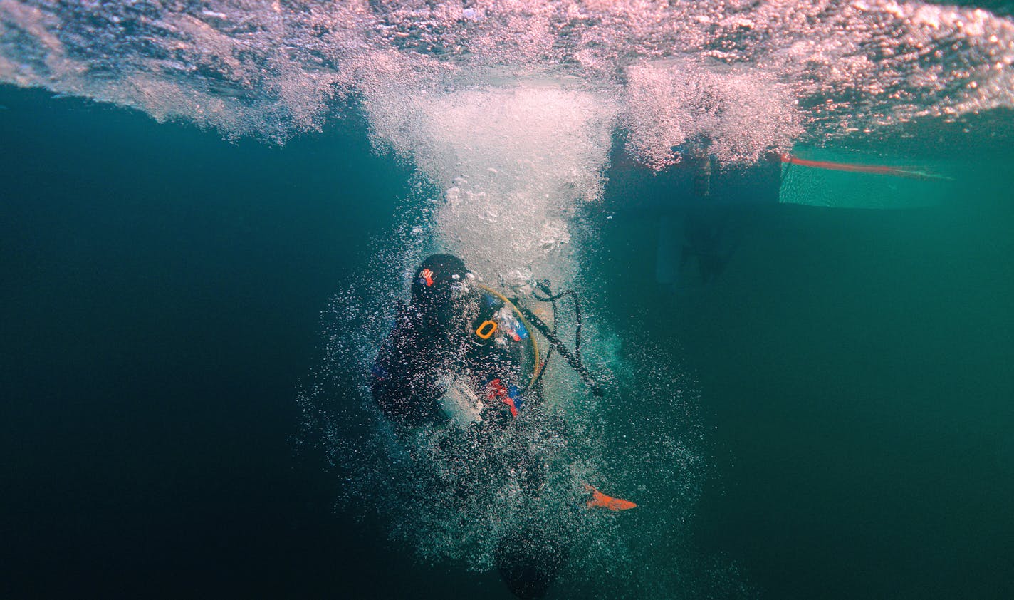 Jack Decker, a diver with the Great Lakes Shipwreck Preservation Society from Clear Lake, Iowa, splashed into the water after making a giant stride entry from the group's boat the RV Preservation to dive the Hesper. ] ANTHONY SOUFFLE &#x2022; anthony.souffle@startribune.com The scuba divers of the Great Lakes Shipwreck Preservation Society dove the two most accessible shipwrecks, the Hesper, a bulk-freighter steamship that sank in Lake Superior on May 4, 1905 off Silver Bay and the Madeira, a sc