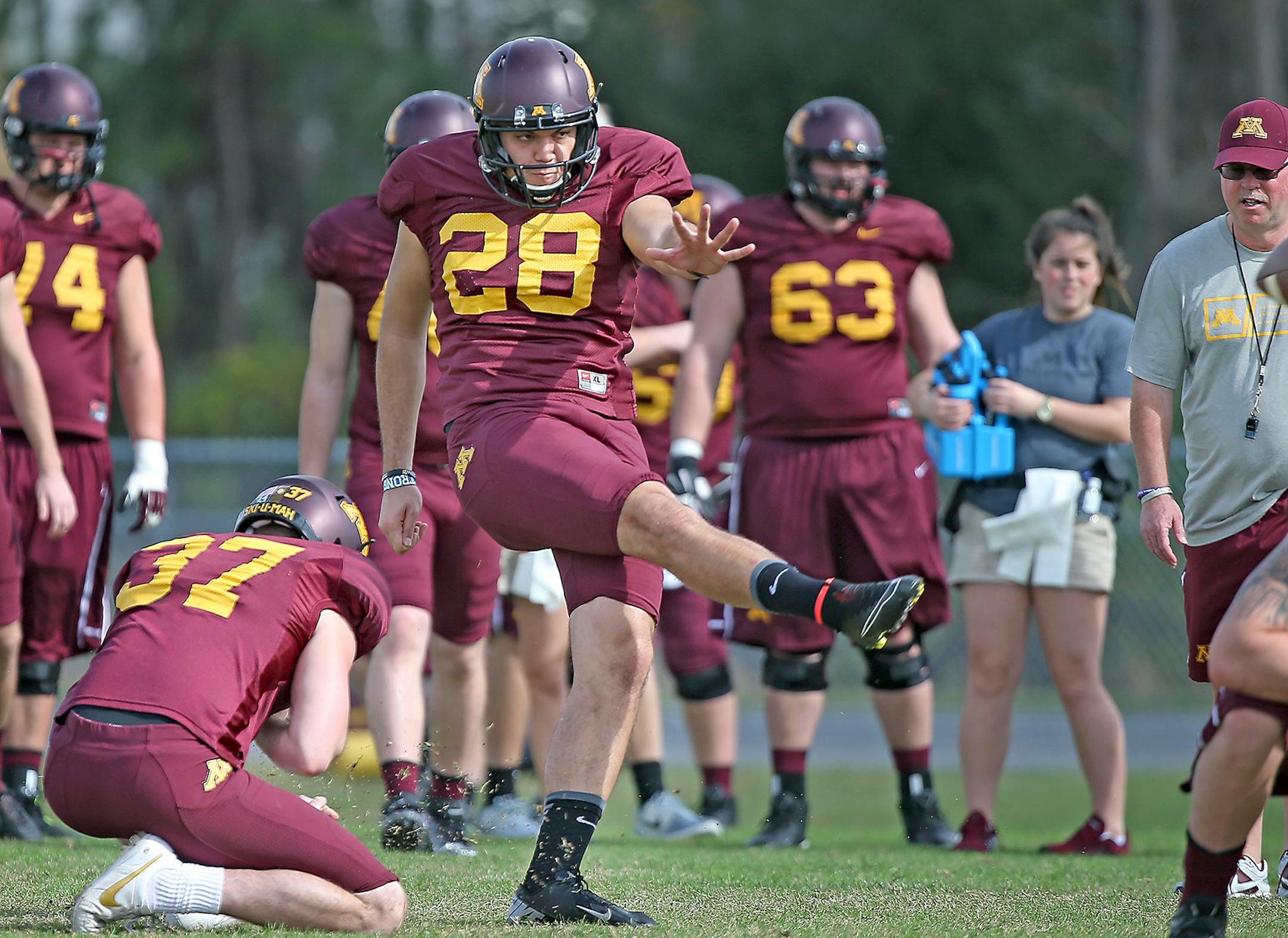 Minnesota kicker Ryan Santoso (28) and Peter Mortell practiced at Freedom High School, December 29, 2014 in Orlando, FL. ] (ELIZABETH FLORES/STAR TRIBUNE) ELIZABETH FLORES • eflores@startribune.com