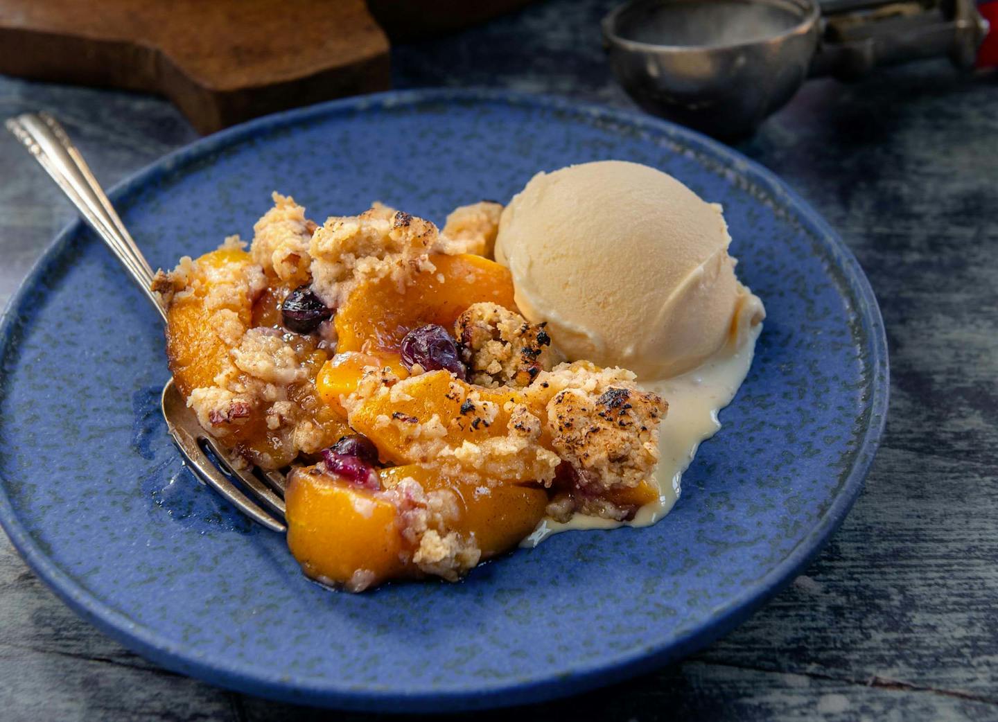 Blueberry Peach Cobbler from Matt Abdoo and Shane McBride in "Pig Beach BBQ Cookbook" (Harvest, 2022). Credit: Ken Goodman