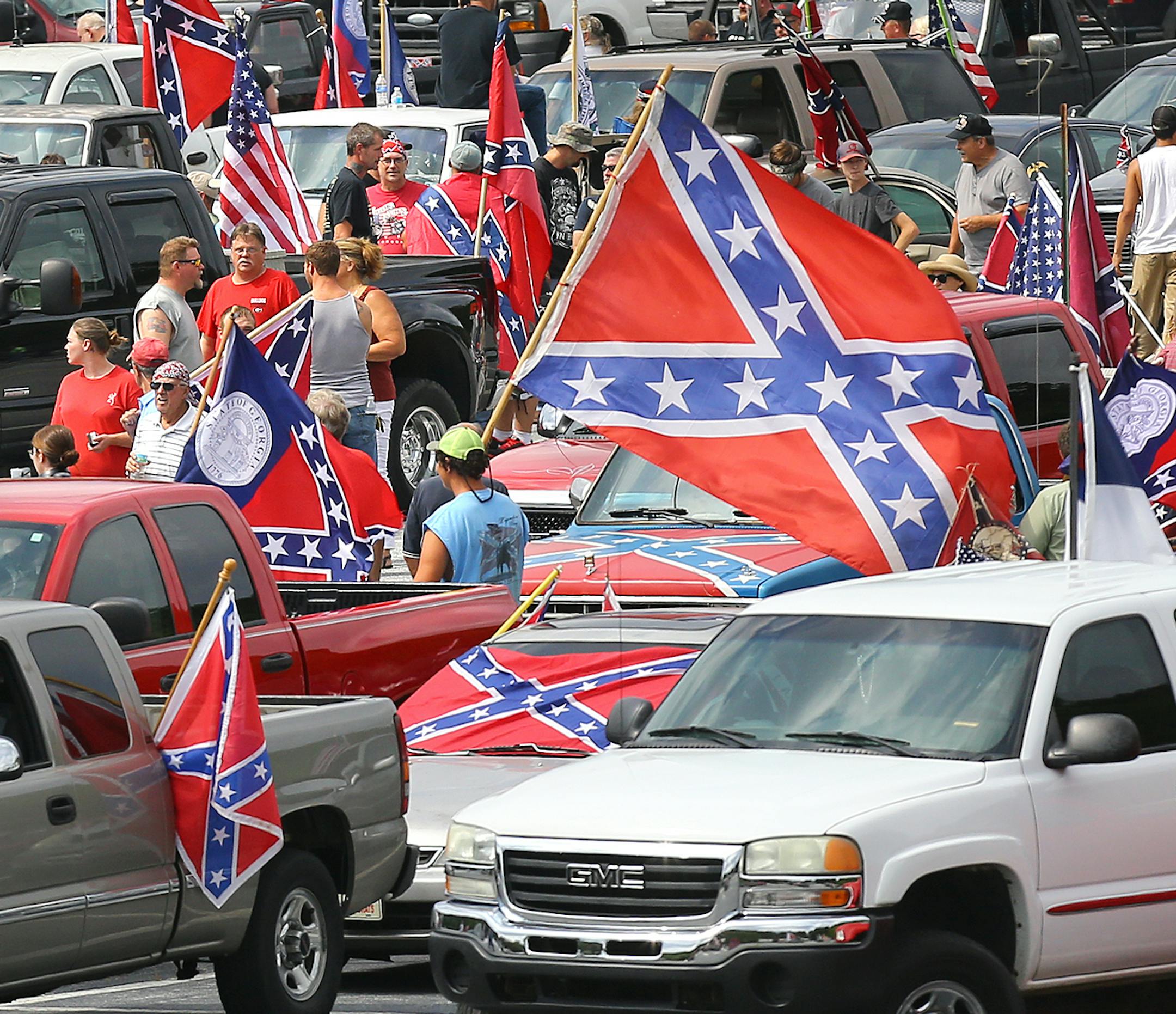 Pro-Confederate flag supporters gather for a rally at Stone Mountain Park on Saturday, Aug. 1, 2015, in Stone Mountain, Ga. (Curtis Compton/Atlanta Journal-Constitution via AP) MARIETTA DAILY OUT; GWINNETT DAILY POST OUT; LOCAL TELEVISION OUT; WXIA-TV OUT; WGCL-TV OUT; MANDATORY CREDIT