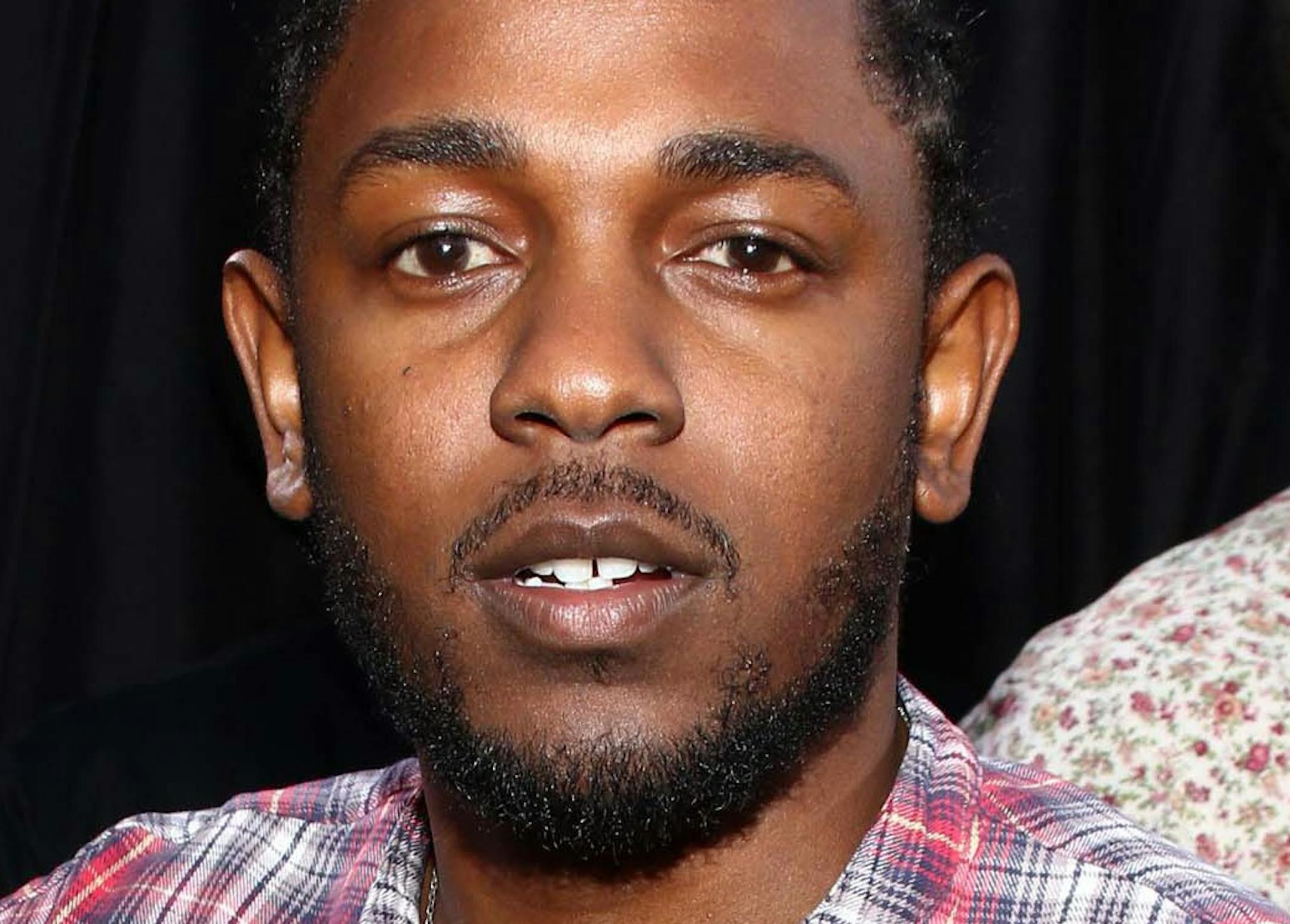 Kendrick Lamar arrives at the Los Angeles premiere of "Straight Outta Compton" at the Microsoft Theater on Monday, Aug. 10, 2015. (Photo by John Salangsang/Invision/AP) ORG XMIT: CAPM105