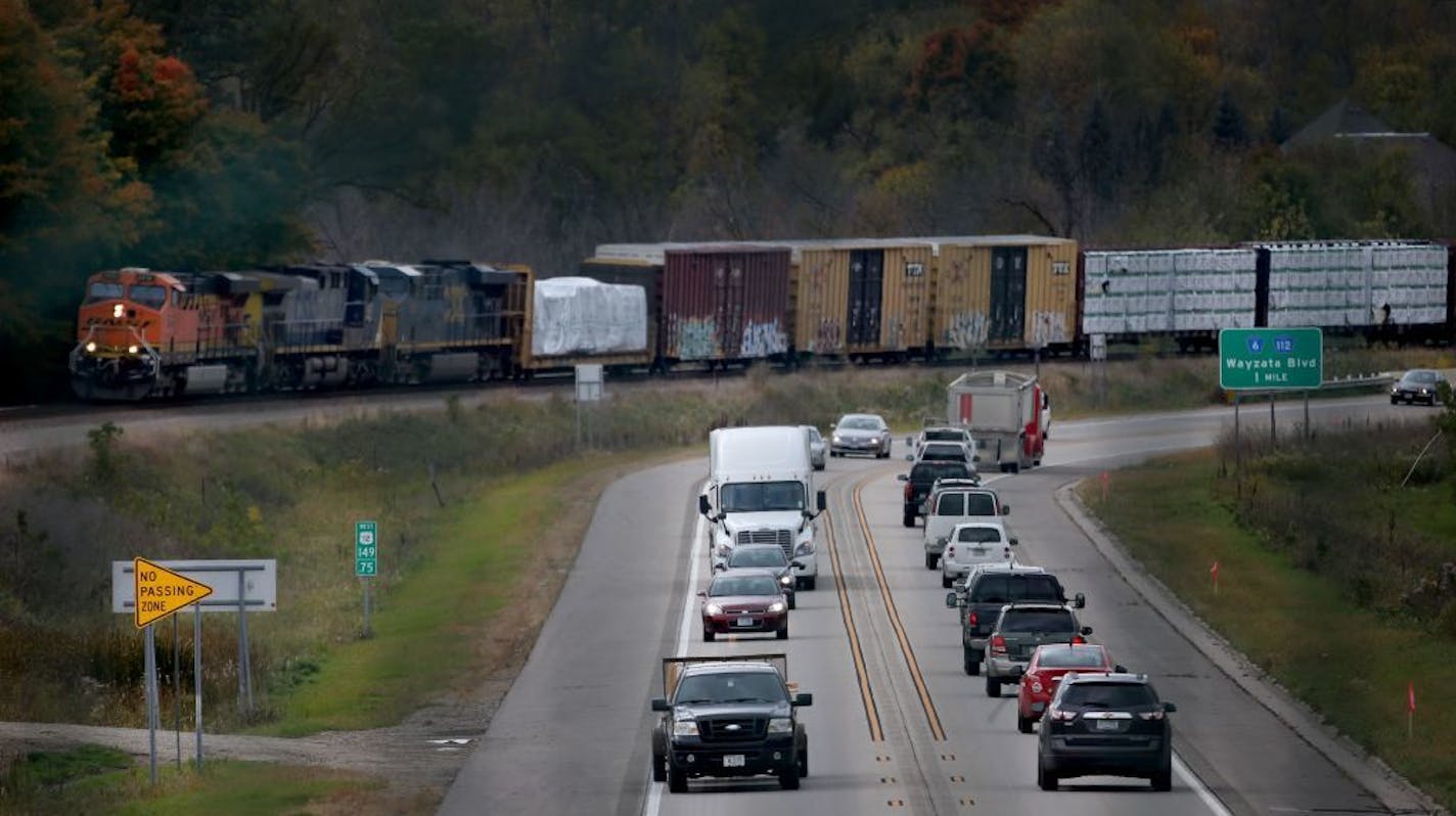 Rush hour traffic flows along Highway 12, seen from the Old Crystal Bay Road overpass looking west, Friday, Oct. 7, 2016, in Orono, MN.