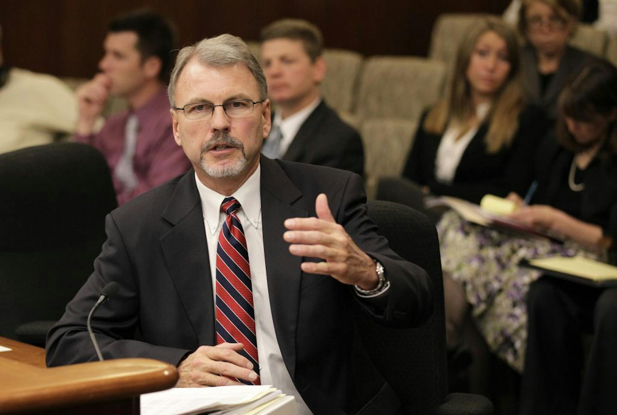 Minnesota Corrections Commissioner Tom Roy told a panel of legislators Thursday morning that parole hearings for murderers are the "dark, dark days in my life,'' but defended his recent decision to parole a convicted cop-killer as consistent with state law and the practice of his predecessors. Roy, whose decision to parole 62-year-old Timothy Eling prompted an angry response last week from Republican leaders at the Legislature, testified at a hearing crowded with lawmakers, observers and police