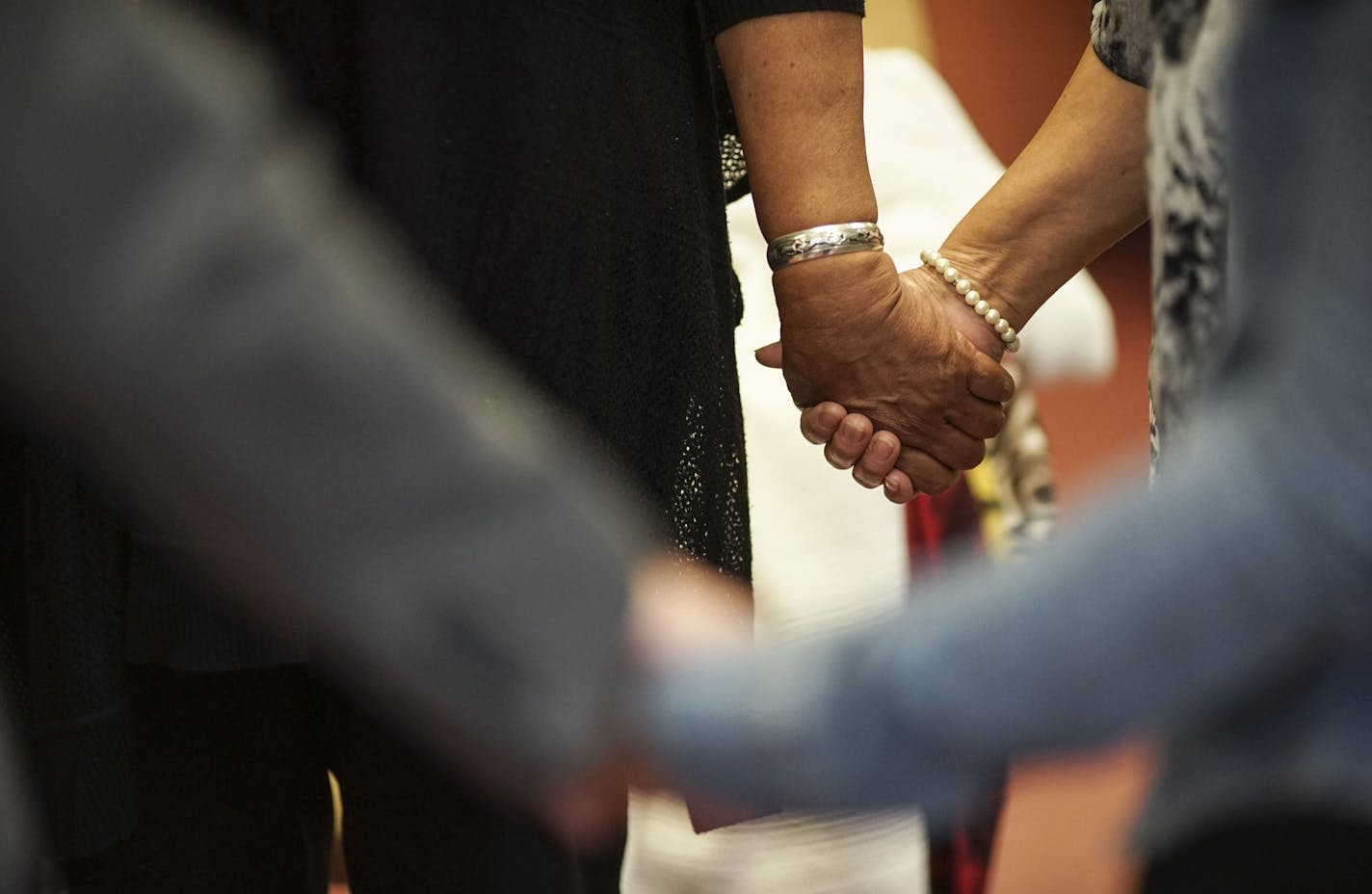 The women held hands in a circle at the end of the session at the Minnesota Indian Women&#x2019;s Resource Center.