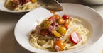 Pasta fredda with cherry tomatoes, anchovies and herbs