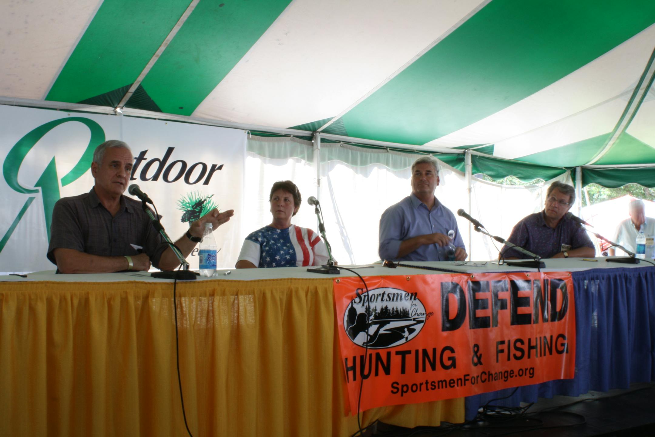 Candidates for governor visited Game Fair on Saturday and talked about issues affecting the outdoors. Discussing guns, hunting and lake-home regulations, among other things, were, from left, Mark Dayton, Linda Eno, Tom Emmer and Tom Horner.