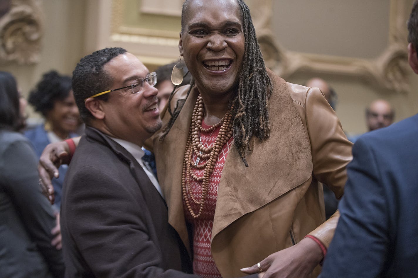 Andrea Jenkins got a hug from Rep. Keith Ellison after being sworn-in as a new council member for Ward 8 in the City Council Chambers, Tuesday, January 2, 2108 in Minneapolis, MN. ] ELIZABETH FLORES &#xef; liz.flores@startribune.com