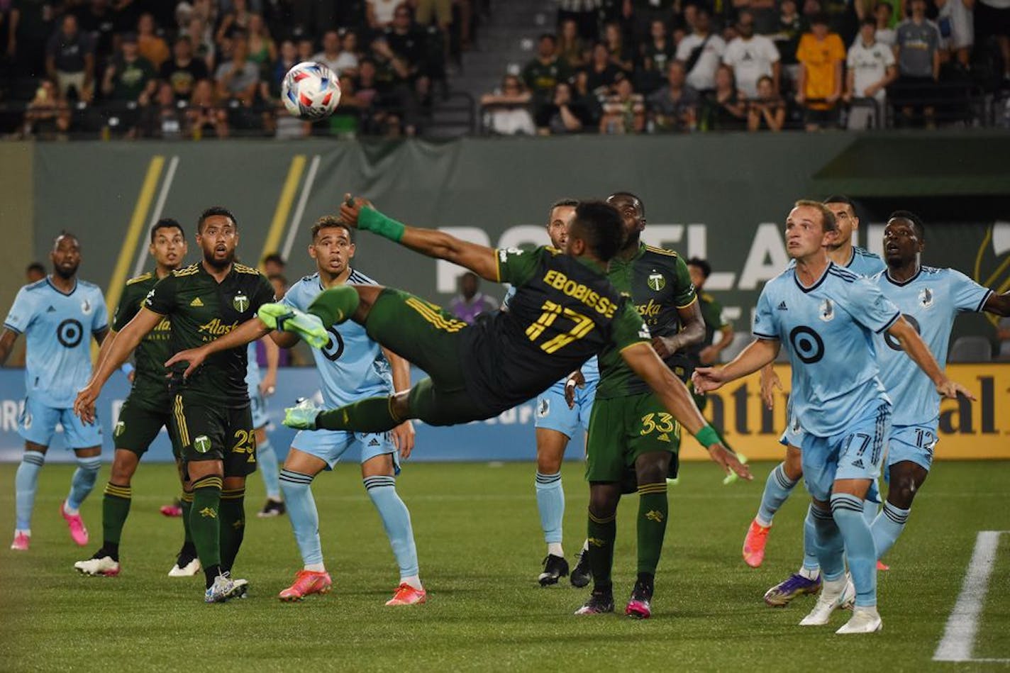 Portland's Jeremy Ebobisse left his feet to play a ball on Saturday night against Minnesota United FC on Saturday, June 26, 2021 at Providence Park in Portland, Ore. (Photo by Rockne Andrew Roll for The Oregonian) ORG XMIT: 20098397P