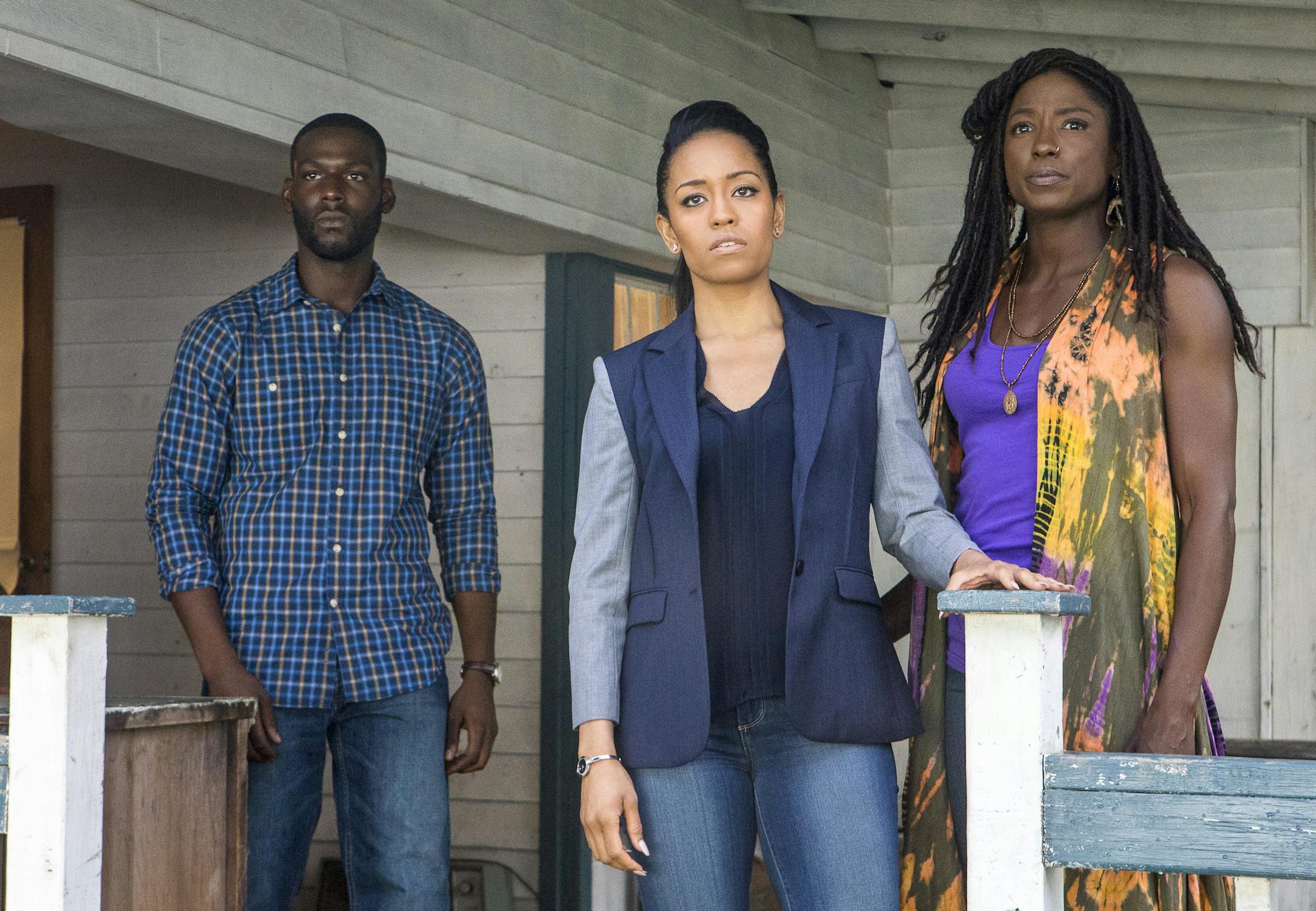 This image released by OWN shows Kofi Siriboe, as Ralph Angel Bordelon, from left, Dawn-Lyen Gardner as Charley Bordelon West and Rutina Wesley as Nova Bordelon in a scene from "Queen Sugar," premiering on Sept. 6. (Skip Bolen/OWN via AP)