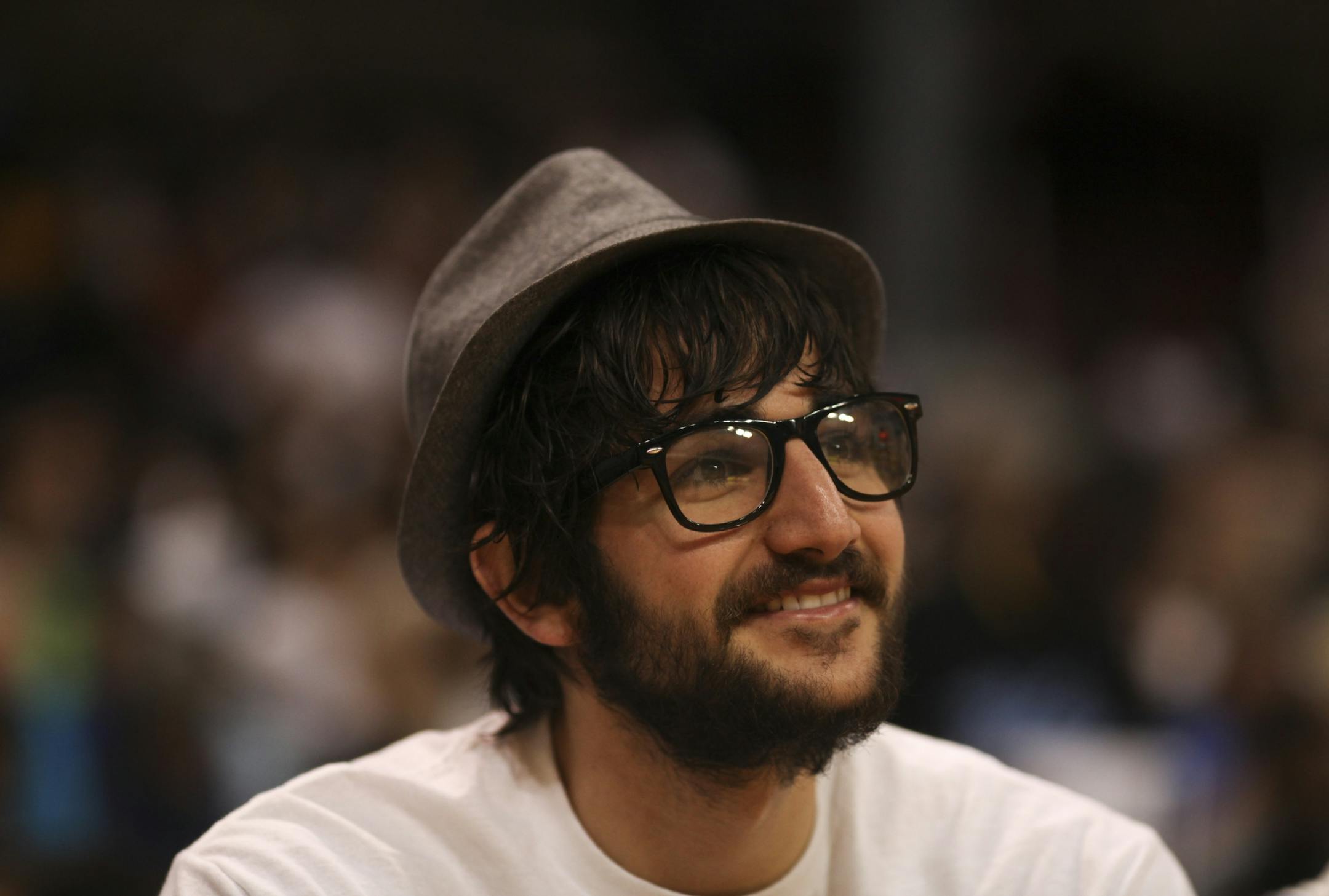 the injured Timberwolf Ricky Rubio shpwed up to watch the second half of an exhibition game at the University of Minnesota's Sports Pavilion Tuesday, May 15, 2012. Lynx won 82-61.