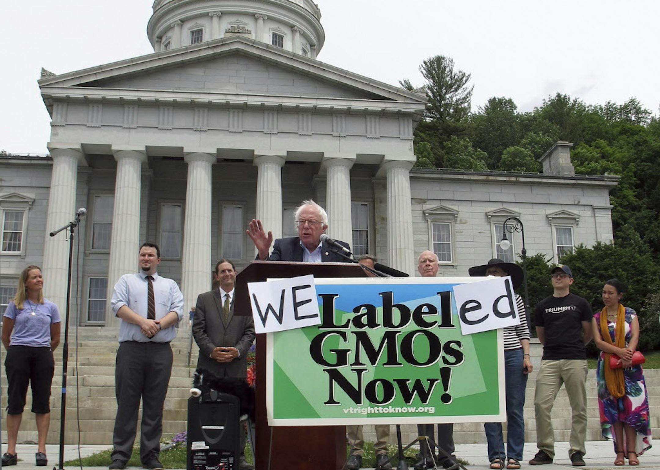Democratic presidential candidate Sen. Bernie Sanders speaks at a rally the Vermont Statehouse, Friday July 1, 2016 in Montpelier, Vt., held to commemorate the implementation of the nation's first state law to require the labeling of foods made with genetically modified ingredients. (AP Photo/Wilson Ring)