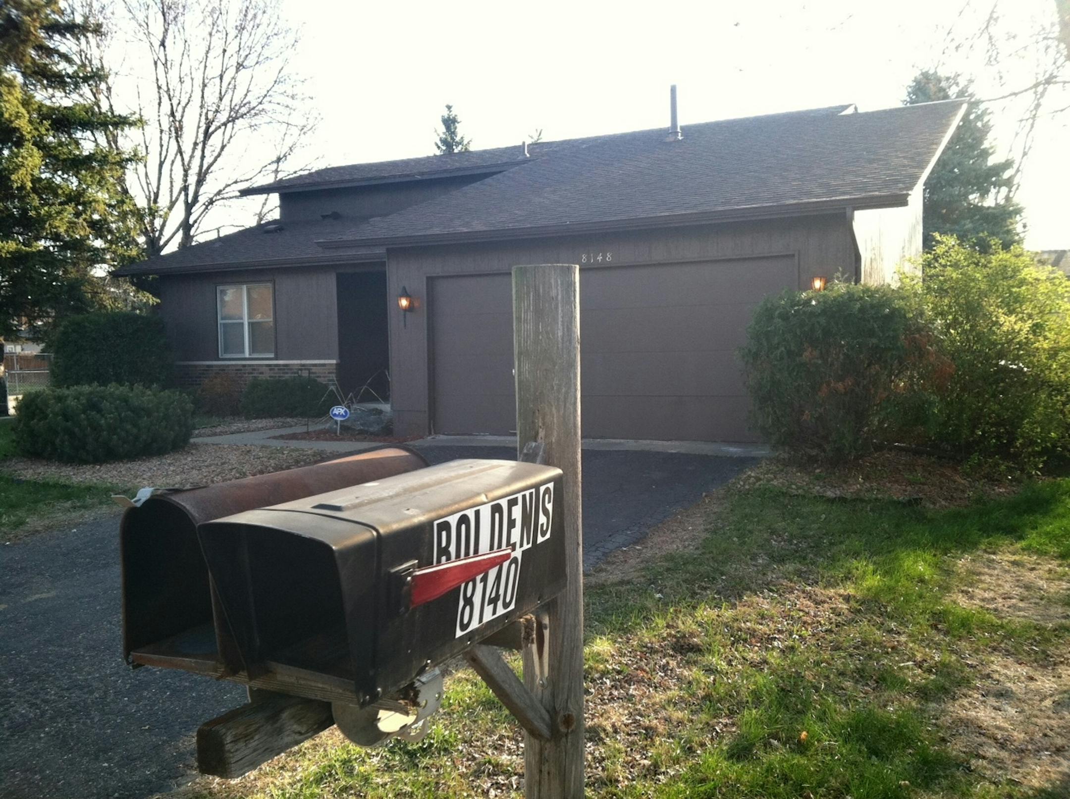 Home in photo is at 8148 Hampshire Ct. in Brooklyn Park. Mailbox at right with name "Boldens" refers to home NOT IN PHOTO.