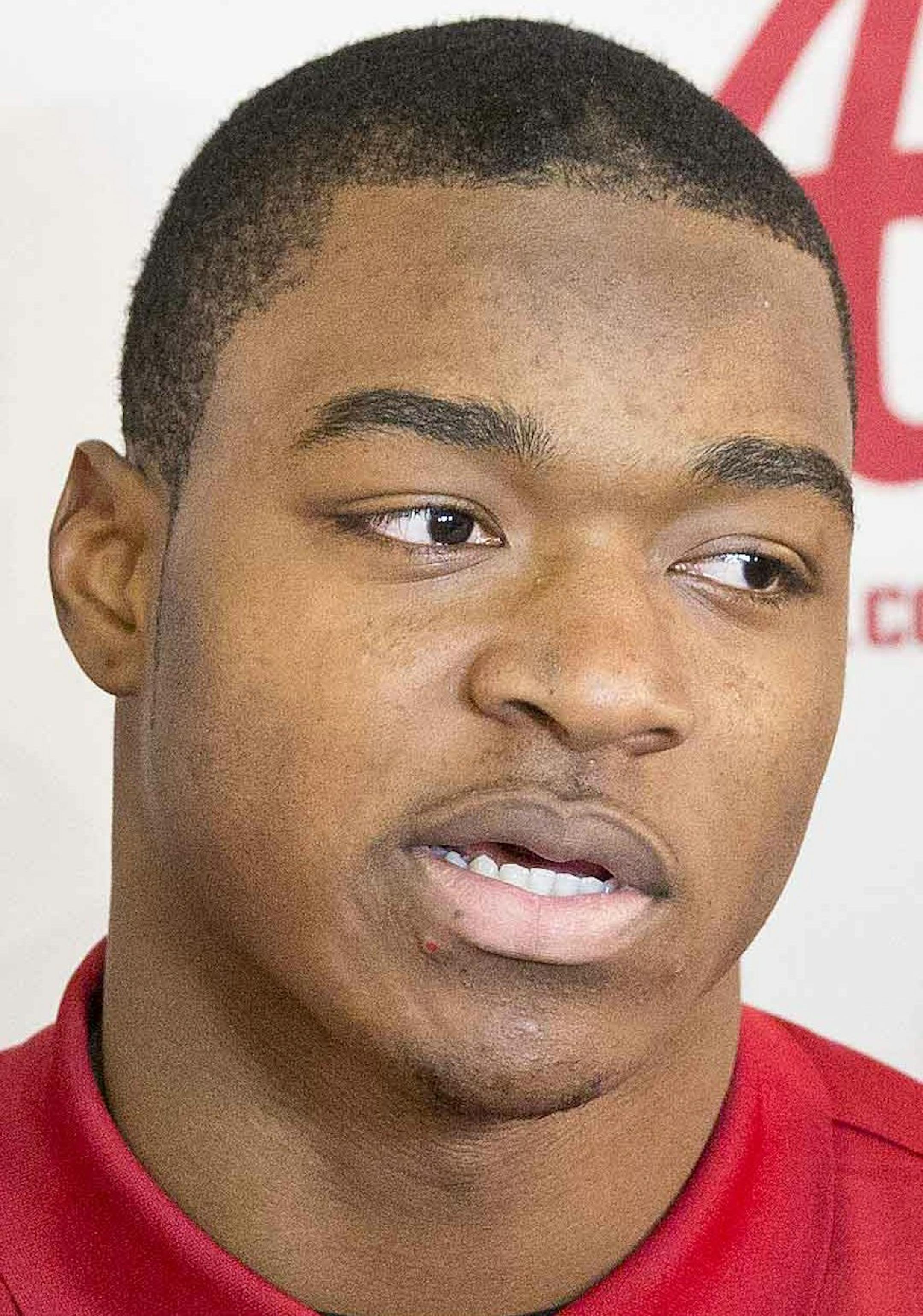 Alabama NCAA college football wide receiver Amari Cooper answers questions from reporters after he announced his decision to enter the NFL draft during a press conference, Friday, Jan. 9, 2015, in Tuscaloosa, Ala. (AP Photo/Brynn Anderson)