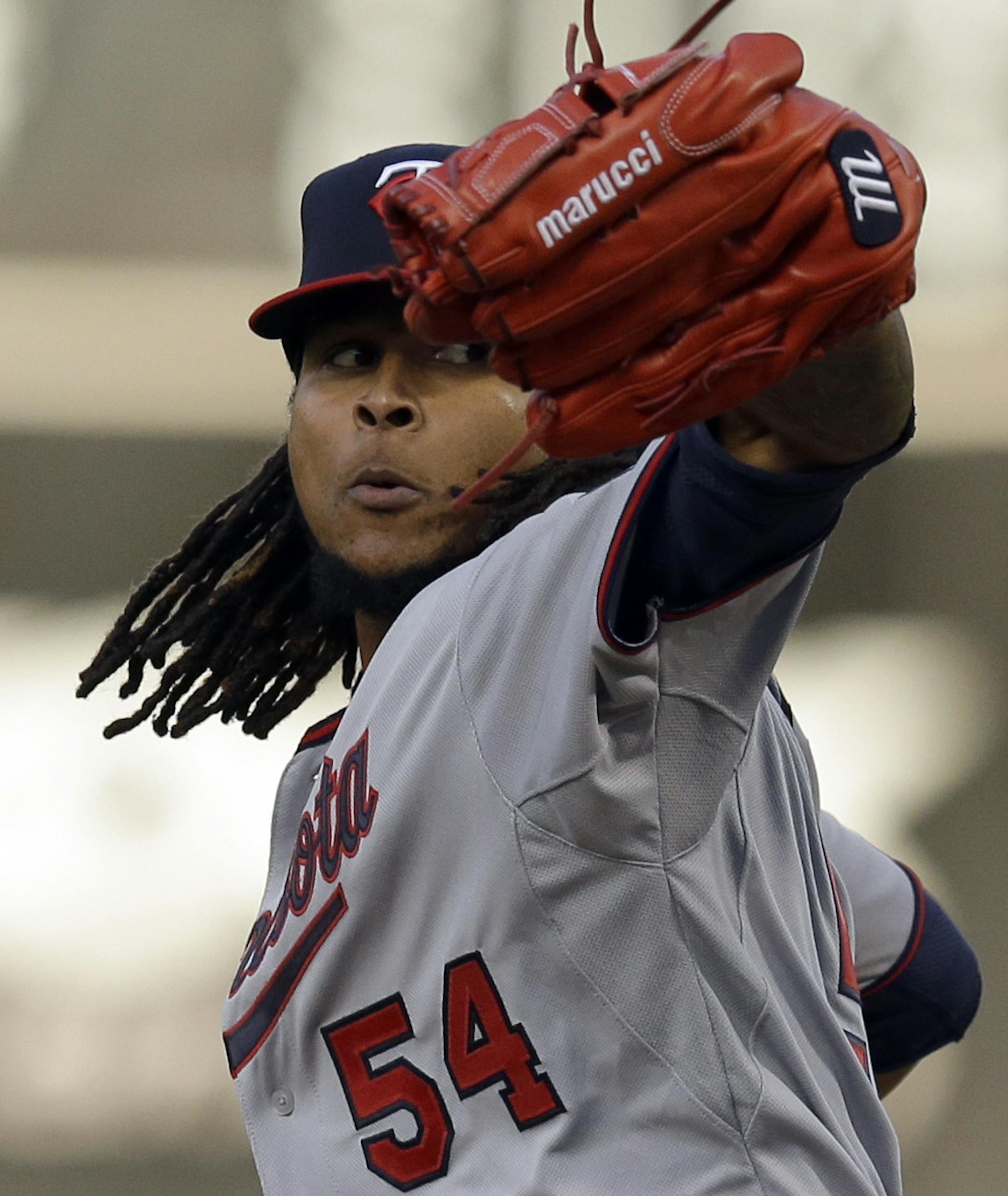 Minnesota Twins pitcher Ervin Santana works against the Oakland Athletics in the first inning of a baseball game Friday, July 17, 2015, in Oakland, Calif. (AP Photo/Ben Margot)