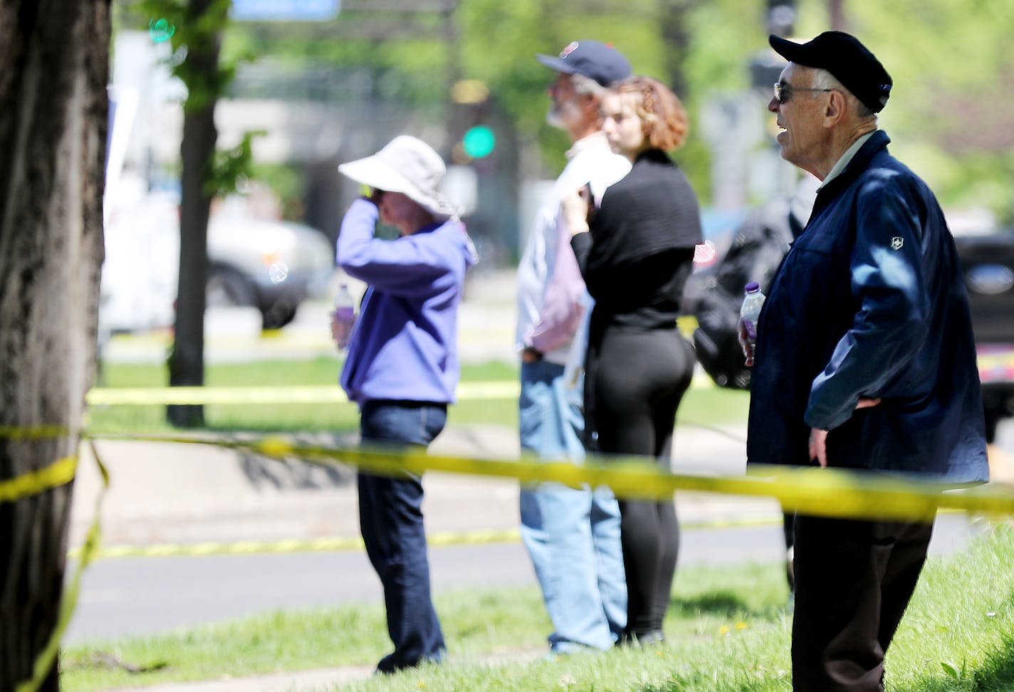 Al Plehal of Minnetonka, right, joined other onlookers watching the domolition of Lola on the Lake at the pavilion at Bde Maka Ska/Lake Calhoun, damaged beyond repair during a recent fire and seen Tuesday, May 28, 2019, in Minneapolis, MN.] DAVID JOLES &#x2022; david.joles@startribune.com Minnehaha Creek is flooding near Penn Av. and 54th street, which has uprooted trees in some areas. The Minnehaha Creek Watershed District website said the high water on the creek is expected to continue for the