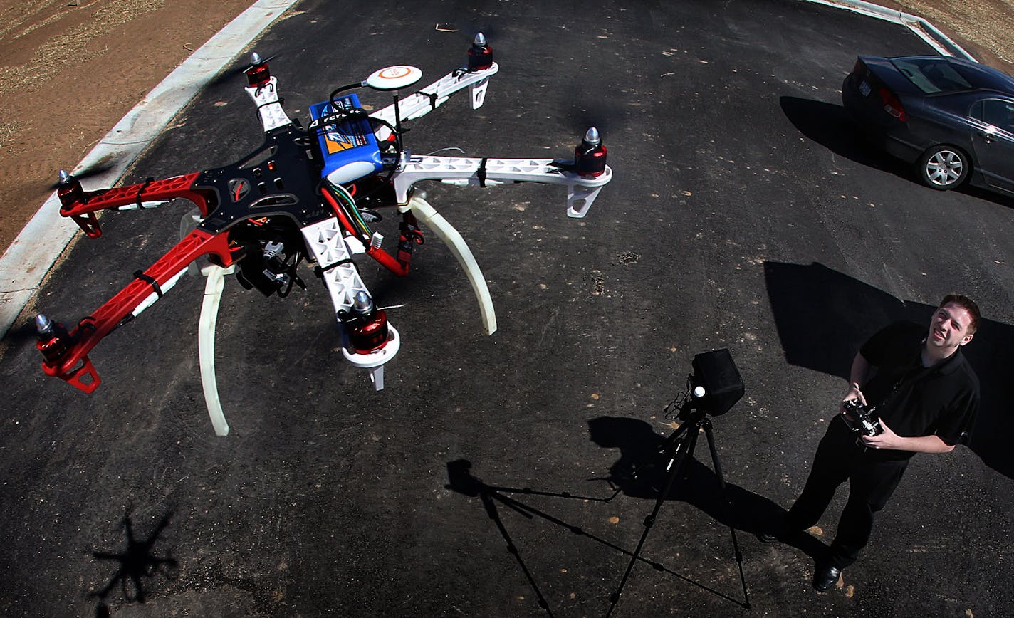 Realtor Brandon Doyle demonstrated a drone (DJI F550 with Zenmue Gimbal & Video Downlink) equipped with a small, HD camera that he uses to photograph real estate listings. ] JIM GEHRZ &#x201a;&#xc4;&#xf6;&#x221a;&#xd1;&#xac;&#xa2; jgehrz@startribune.com / Maple Grove, MN / April 8, 2014 / 1:00 PM / BACKGROUND INFORMATION: A growing number of real estate agents are marketing their listings with aerial photos taken by drones, which are being used to take high-in-the-sky photos of houses and land.