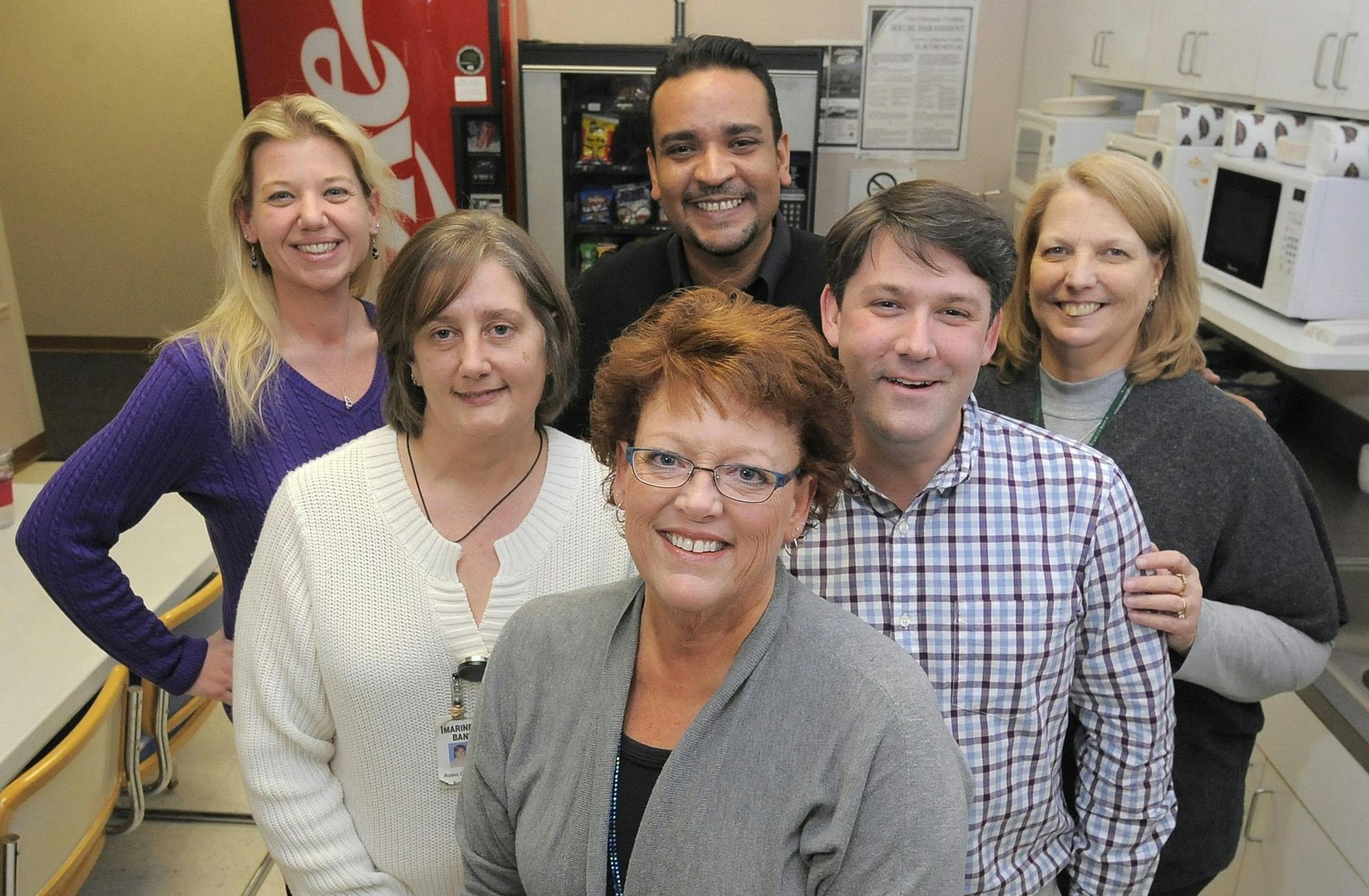 First Mariner Bank employees participating in a wellness program through partnership with Medifast are, left to right, Melissa Ferrell, lost 103 lbs; Robin Courtney, lost 67 lbs; Janis Smith, lost 65 lbs; Felipe Rojas, lost 72 lbs; Chris Plude, lost 20 lbs and Lorraine Ash, lost 60 lbs. (Kim Hairston/Baltimore Sun/MCT) ORG XMIT: 1148305