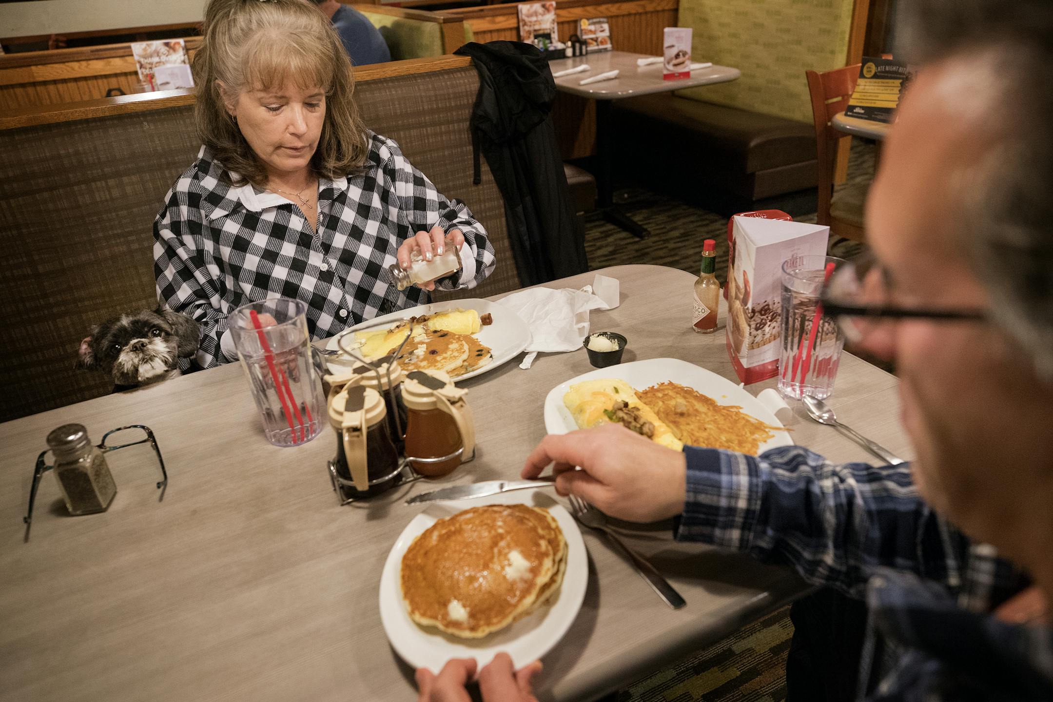 Jane Poeschel and therapy dog Trudy had dinner with Derek Myers at Perkins in New Brighton. ] CARLOS GONZALEZ ï cgonzalez@startribune.com - November 2017, Jane Poeschel and her Shih Tzu therapy dog Trudy, the unassuming pair that found themselves in the middle of a federal lawsuit about disability rights and housing discrimination