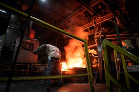 A worker prepared a ladle filled with molten iron at Smith Foundry Tuesday, Dec. 12, 2023  Minneapolis, Minn.  For years, residents have been complain