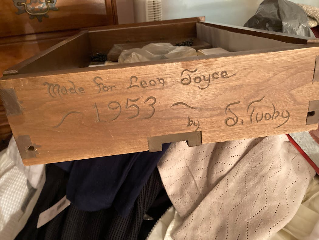 Joseph Tuohy signed the back of this dresser drawer.
