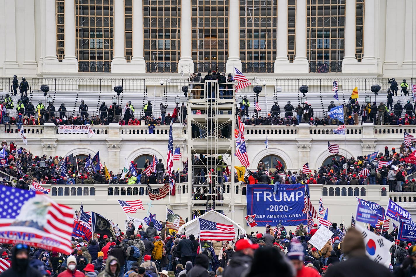 In this Jan. 6, 2021, file photo insurrectionists loyal to President Donald Trump breach the Capitol in Washington.