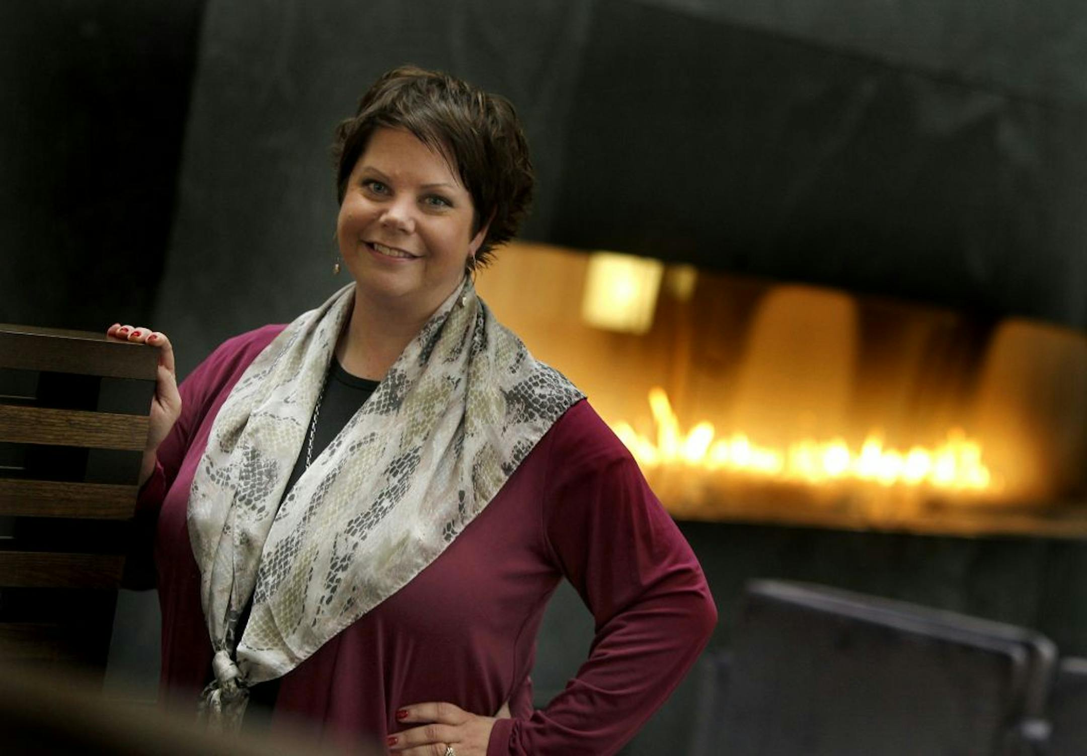 HelmsBriscoe's Kris Finger, a global meeting planner, is in the process of organizing two meetings at the Hyatt Regency Hotel that will potentially bring in several thousand visitors to downtown Minneapolis. Finger met with other organizers in the newly remodelled Hyatt Regency lobby, Friday, October 19, 2012. (ELIZABETH FLORES/STAR TRIBUNE) ELIZABETH FLORES � eflores@startribune.com