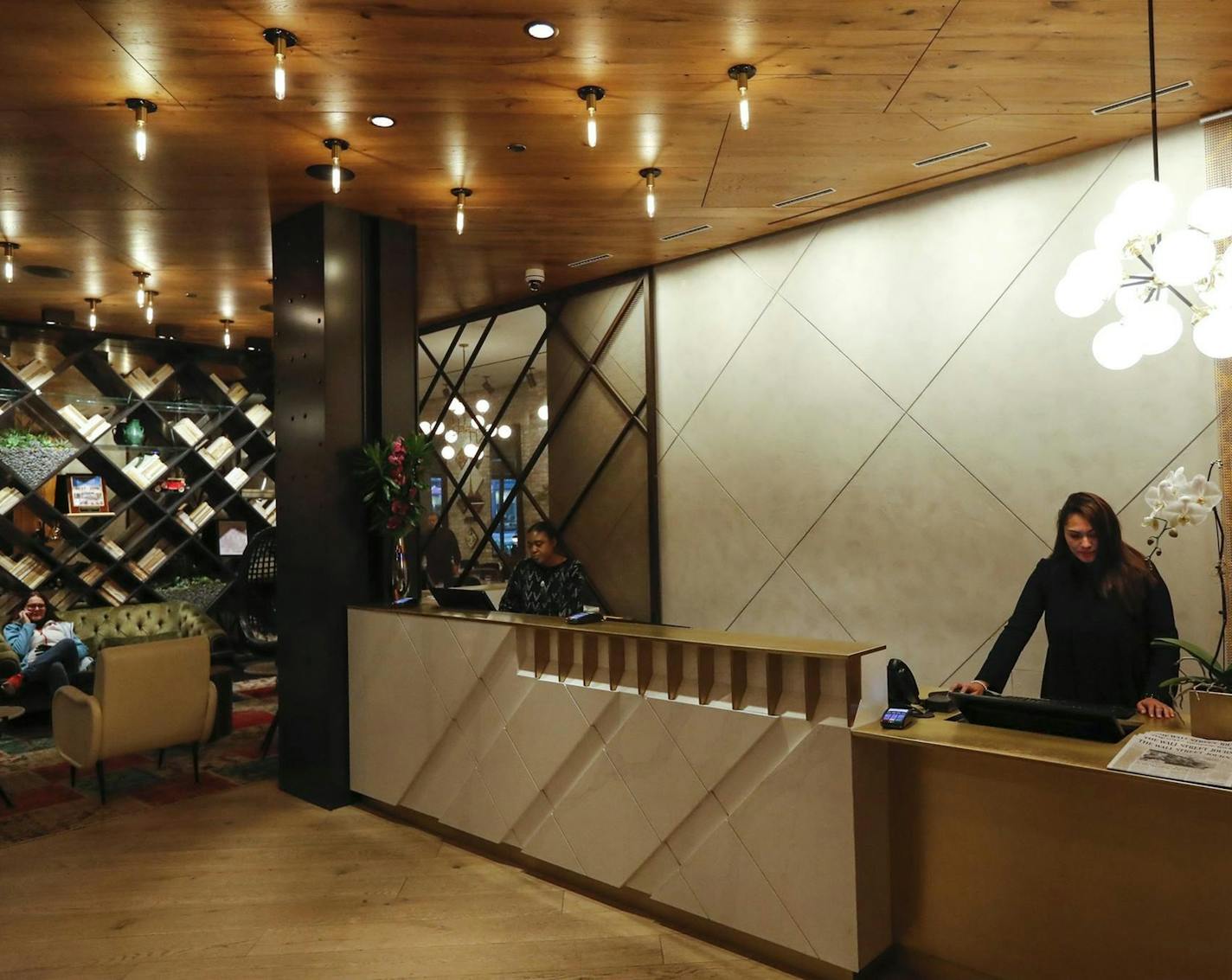 Lobby and reception area at the Hotel Julian, a 218-room boutique hotel in the former Atlantic Bank Building in Chicago, on Wednesday, Oct. 30, 2019. Hotel Julian is offering "bonds" for future stays. (Jose M. Osorio/Chicago Tribune/TNS) ORG XMIT: 1641501