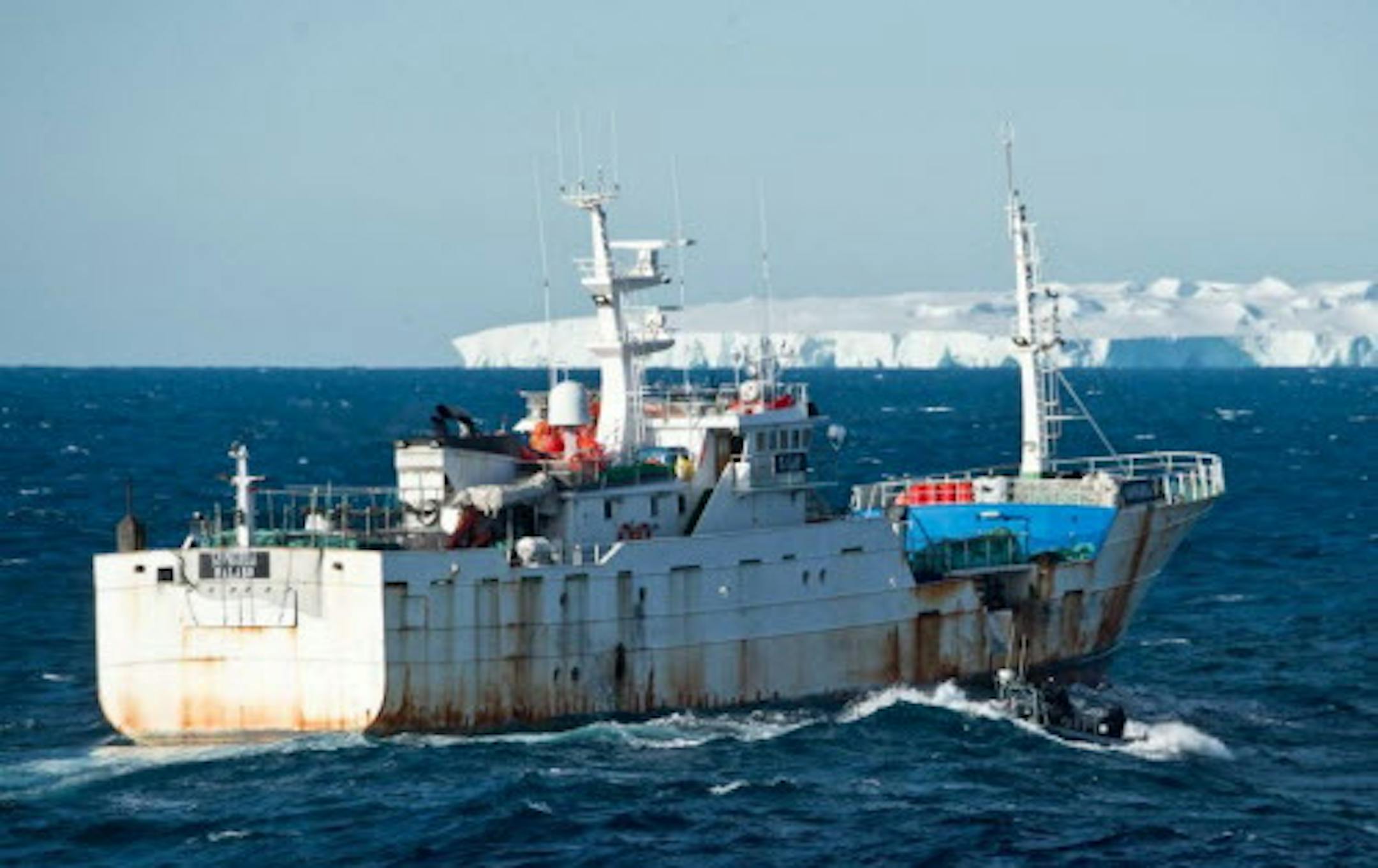 This Jan. 14, 2015 photo provided by the Royal New Zealand Navy shows the illegal fishing boat, the "Songhua" in the Southern Ocean off the coast of New Zealand. In 2008, when the Songhua was named the Paloma V, an investigation linked that ship to a Spanish company, Vidal Armadores. In 2010, the company was fined 150,000 euros for participating in illegal fishing activities with the Paloma V near Antarctica. (AP Photo/ Royal New Zealand Navy)