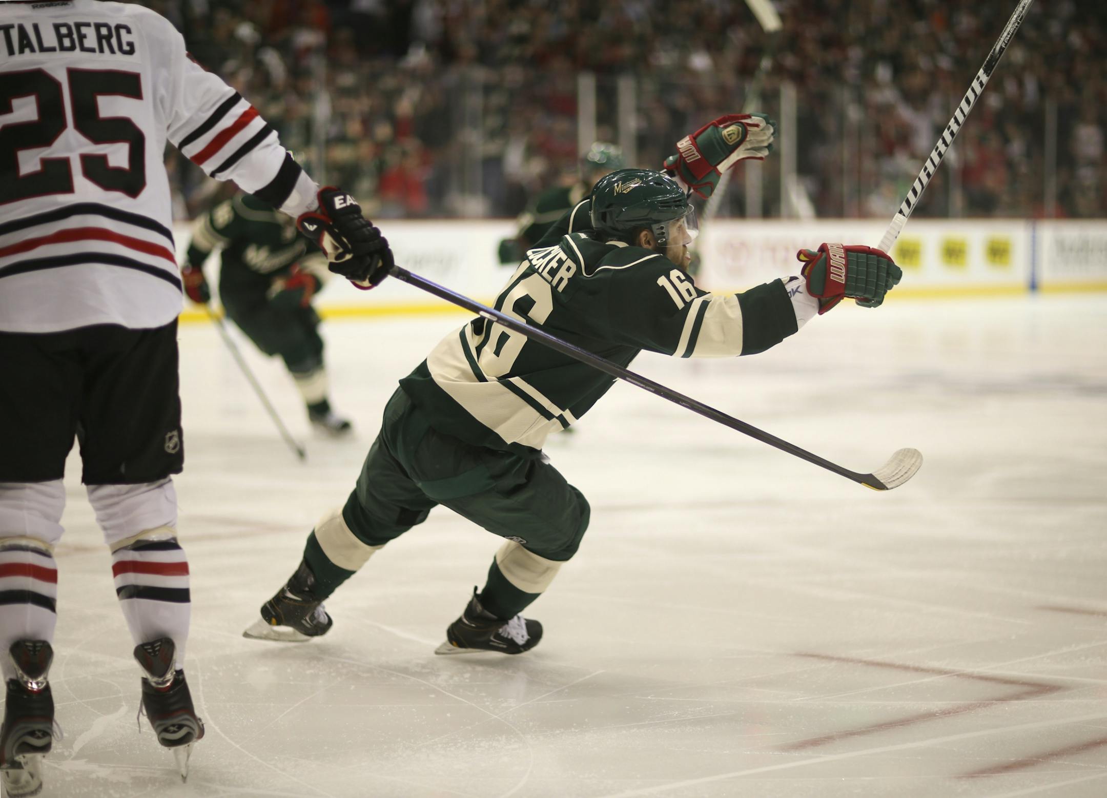 The Minnesota Wild beat the Chicago Black Hawks 3-2 in overtime in game three of their first round playoff series Sunday afternoon, May 25, 2013 at Xcel Energy Center in St. Paul. The Minnesota Wild's Jason Zucker celebrated his game winning goal early in the overtime period Sunday afternoon.