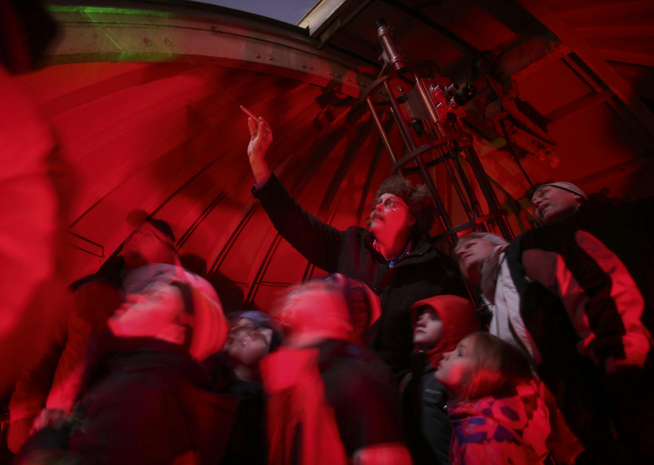 Volunteer Bob Shaw used a laser pointer to point out a feature of the night sky during a demonstration for a group of Cub Scouts in the Eisenhower Observatory Thursday night. ] JEFF WHEELER ï jeff.wheeler@startribune.com The Eisenhower Observatory in Hopkins doesn't have much to see any more, because the night sky has all but disappeared. The city has tried to do something about the main culprit, light pollution, but it can't do much about the rest of the Twin Cities getting brighter every