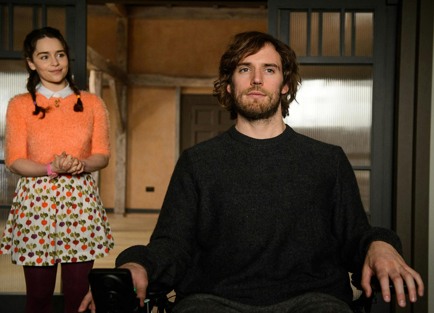 This image released by Warner Bros. Entertainment shows Emilia Clarke, left, and Sam Claflin in a scene from "Me Before You." (Alex Bailey/Warner Bros. Entertainment via AP) ORG XMIT: MIN2016060110223116