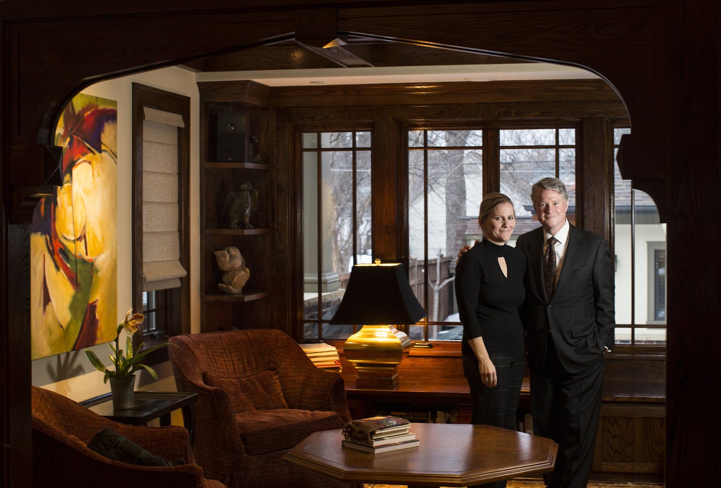 Aimee and Tom Baxter enjoy the sitting room of their new addition, designed to seamlessly merge the old with the new. "We didn't want to put a big modern box on the back," Tom said.